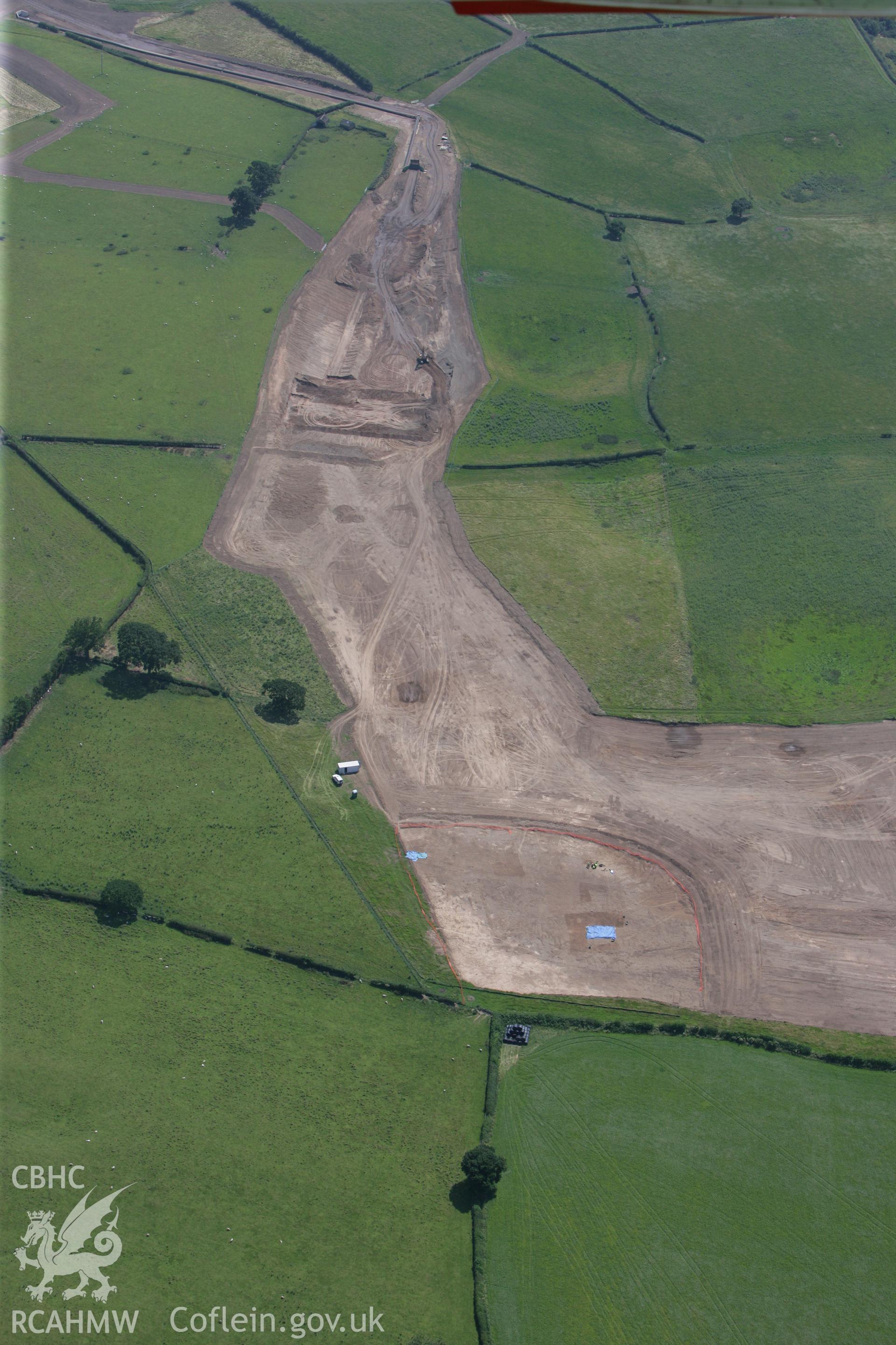 RCAHMW colour oblique photograph of Mosshall Neolithic Settlement, Gresford, under excavation by Clwyd Powys Archaeological Trust. Taken by Toby Driver on 01/07/2008.