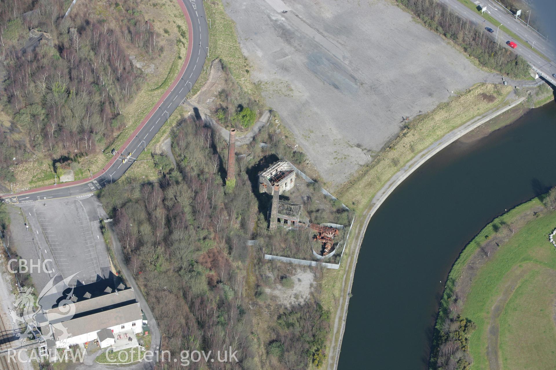 RCAHMW colour oblique photograph of Hafod Copperworks Musgrove Engine Shed, Vivian Works Engine House and Chimney. Taken by Toby Driver on 04/03/2008.