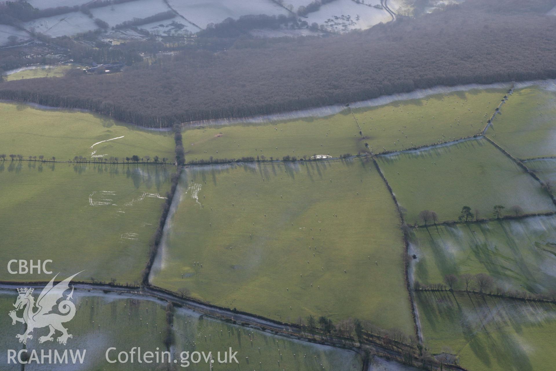 RCAHMW colour oblique photograph of fields to the west of Cerrig Mangor Cairn. Taken by Toby Driver on 15/12/2008.