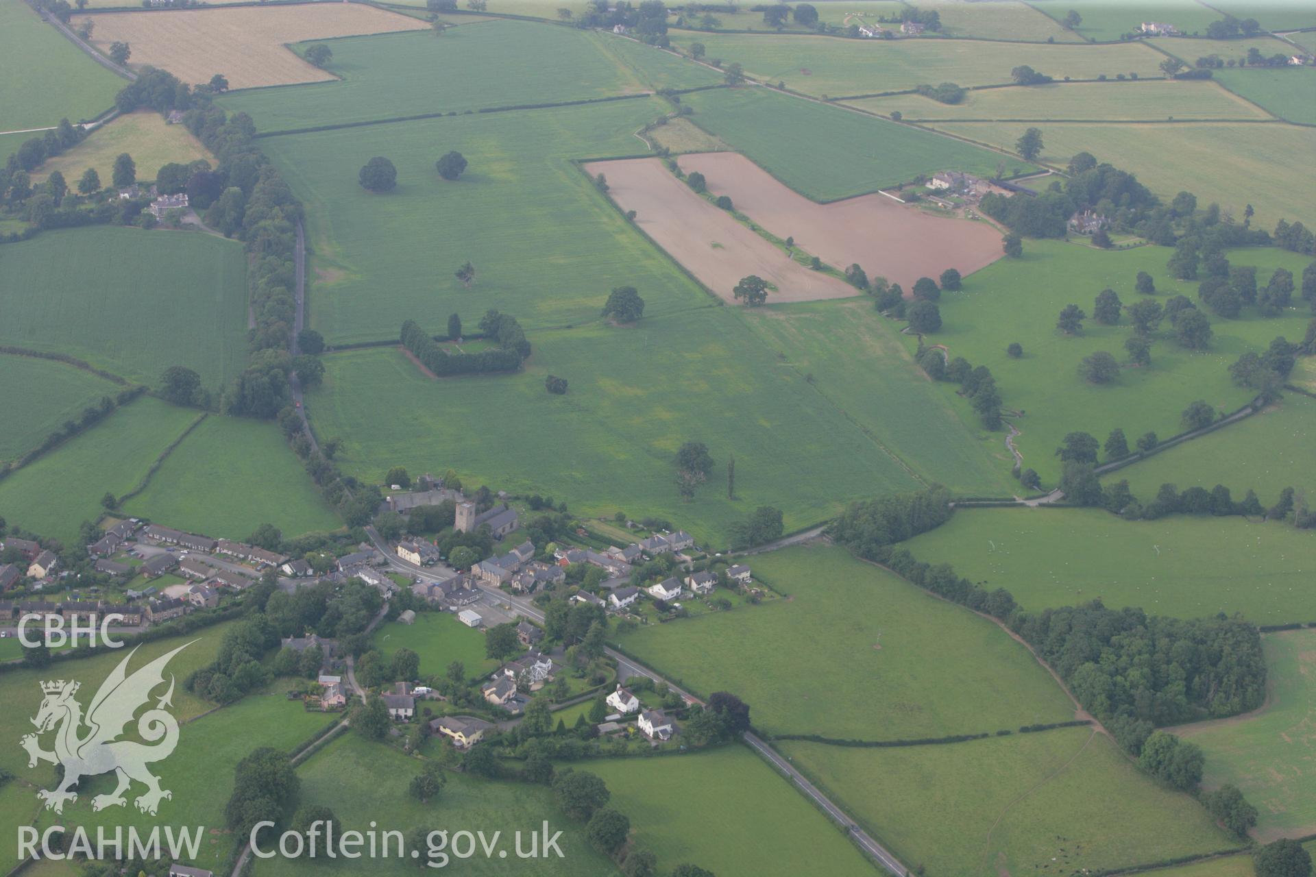 RCAHMW colour oblique photograph of Llanfair Dyffryn Clwyd village, with St Cynfarch and St Mary's Chruch. Taken by Toby Driver on 24/07/2008.