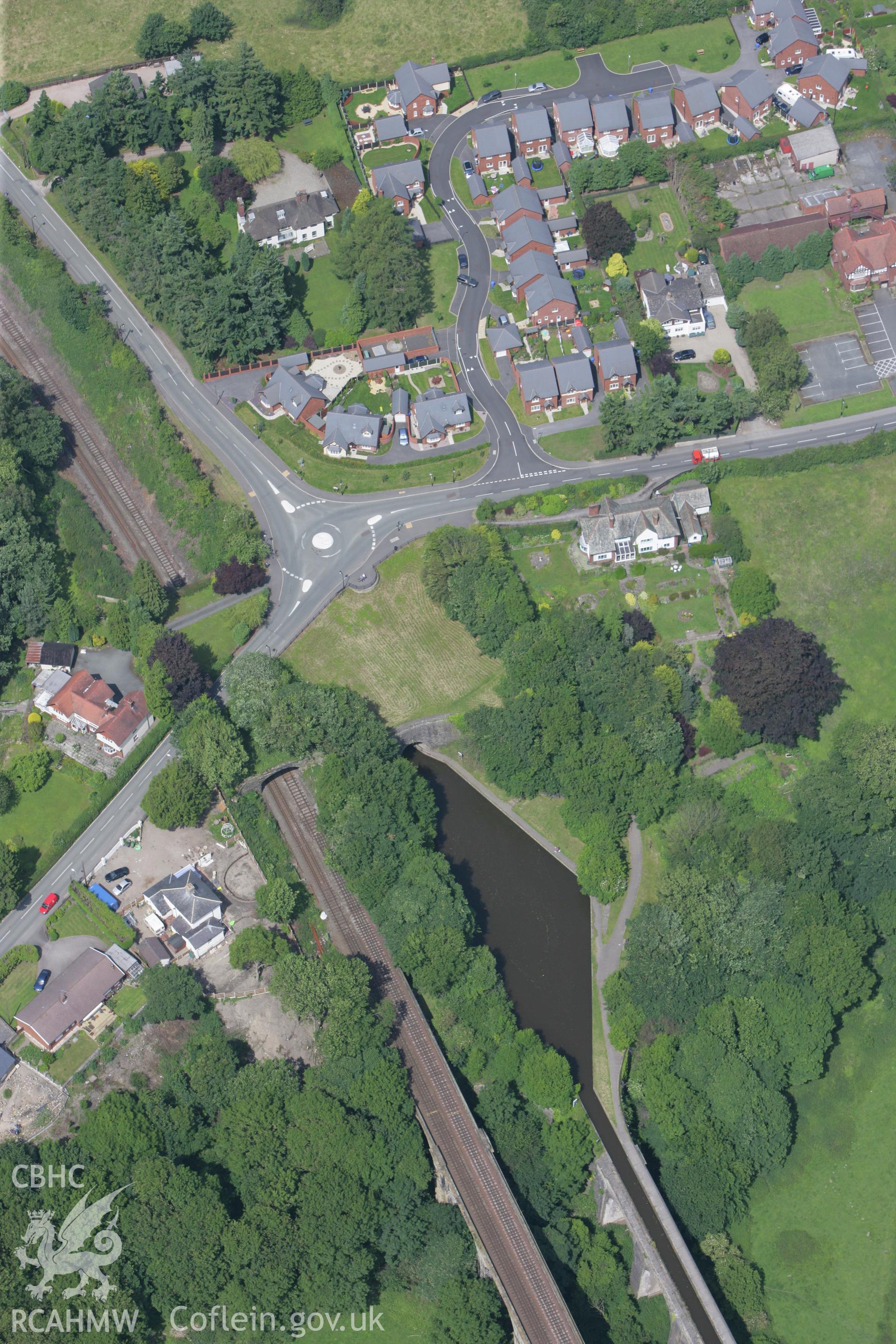 RCAHMW colour oblique photograph of Chirk Canal Basin, with canal and railway tunnels. Taken by Toby Driver on 01/07/2008.