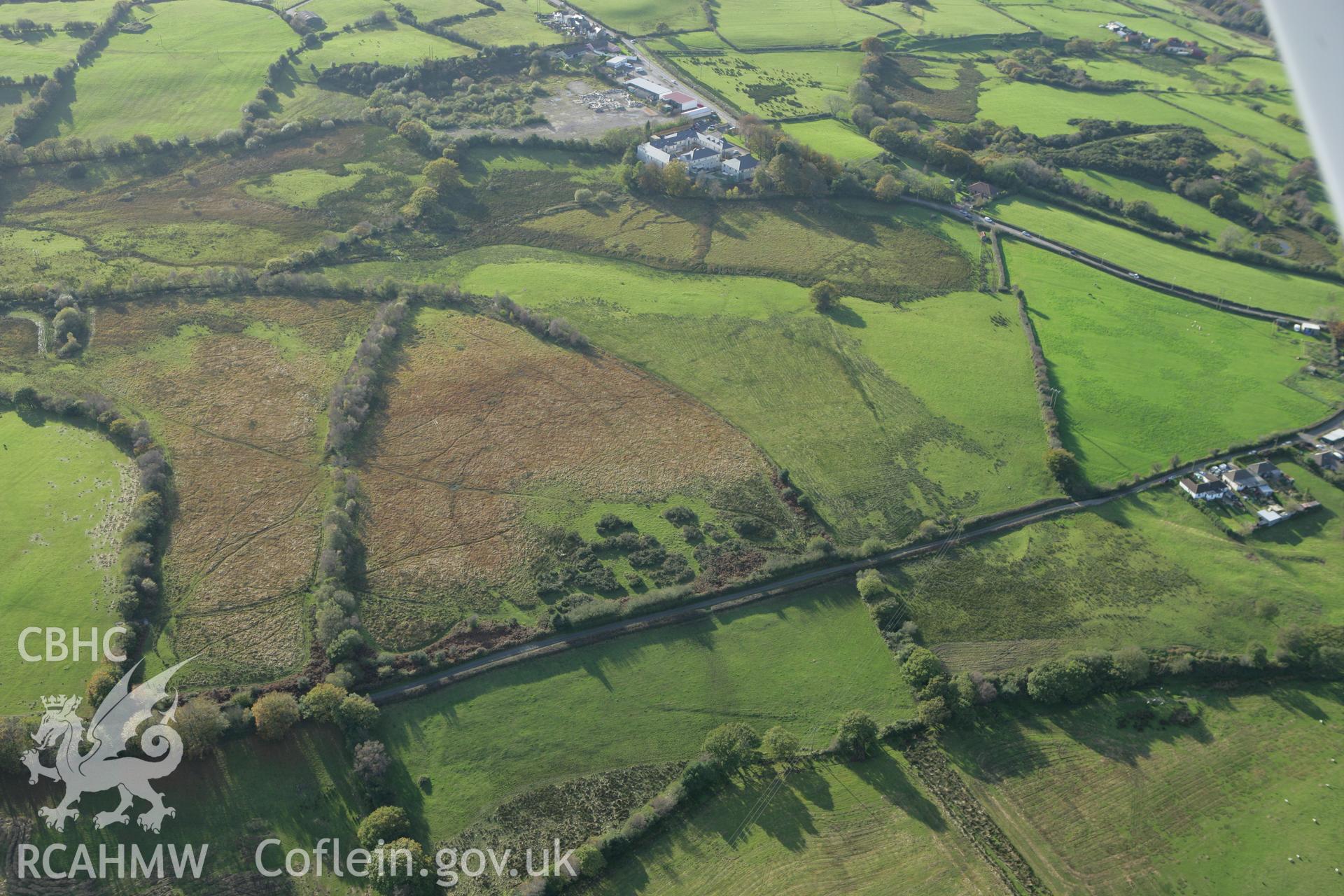 RCAHMW colour oblique photograph of Pen-y-Coedcae Roman Camp. Taken by Toby Driver on 16/10/2008.