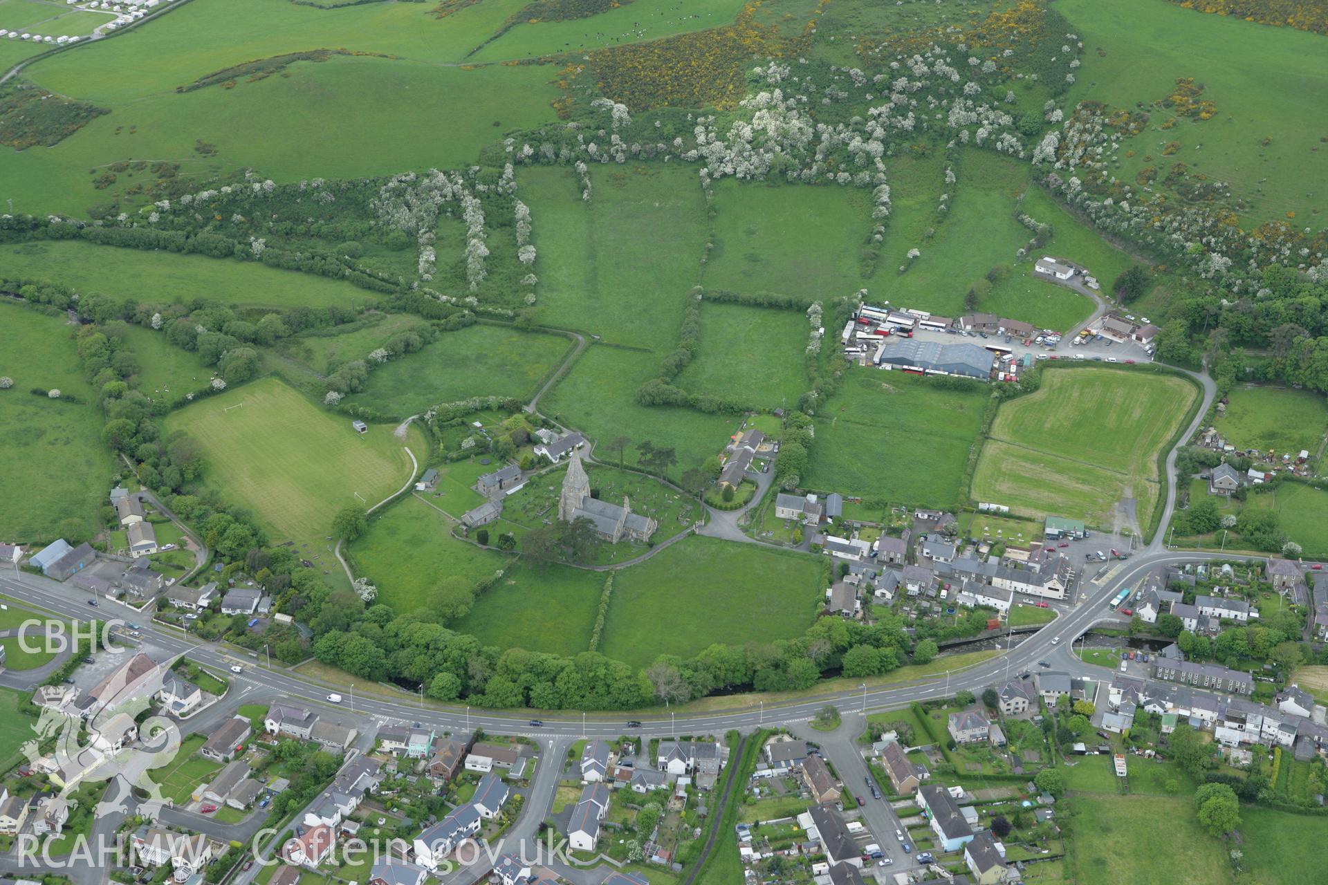 RCAHMW colour oblique photograph of Llanrhystud village, with St Rhystud's Church. Taken by Toby Driver on 20/05/2008.