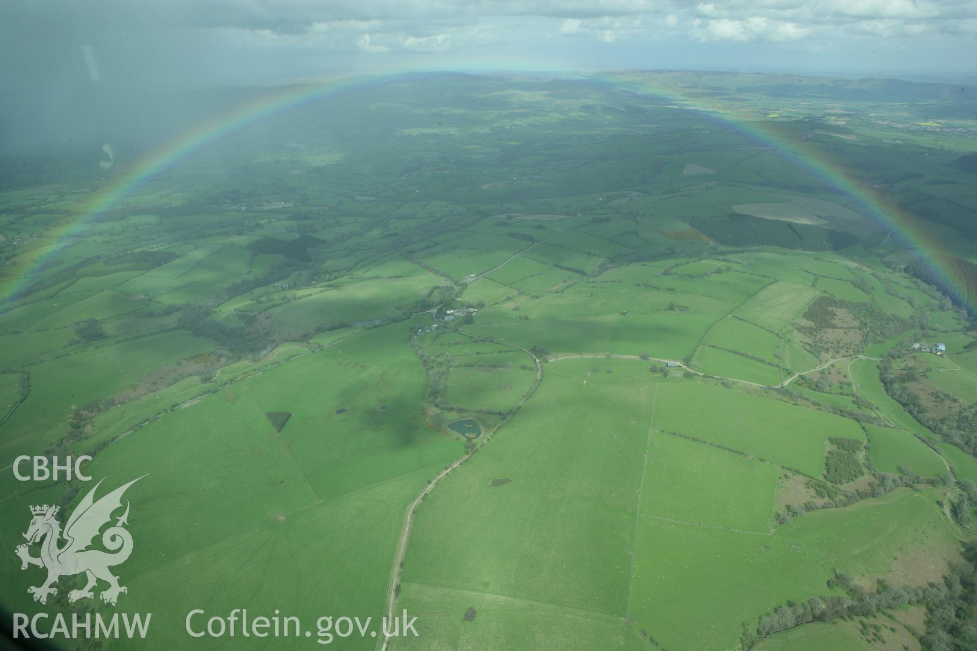 RCAHMW colour oblique photograph of landscape looking north-east towards Mellington Hill Round Barrow. Taken by Toby Driver on 02/05/2008.