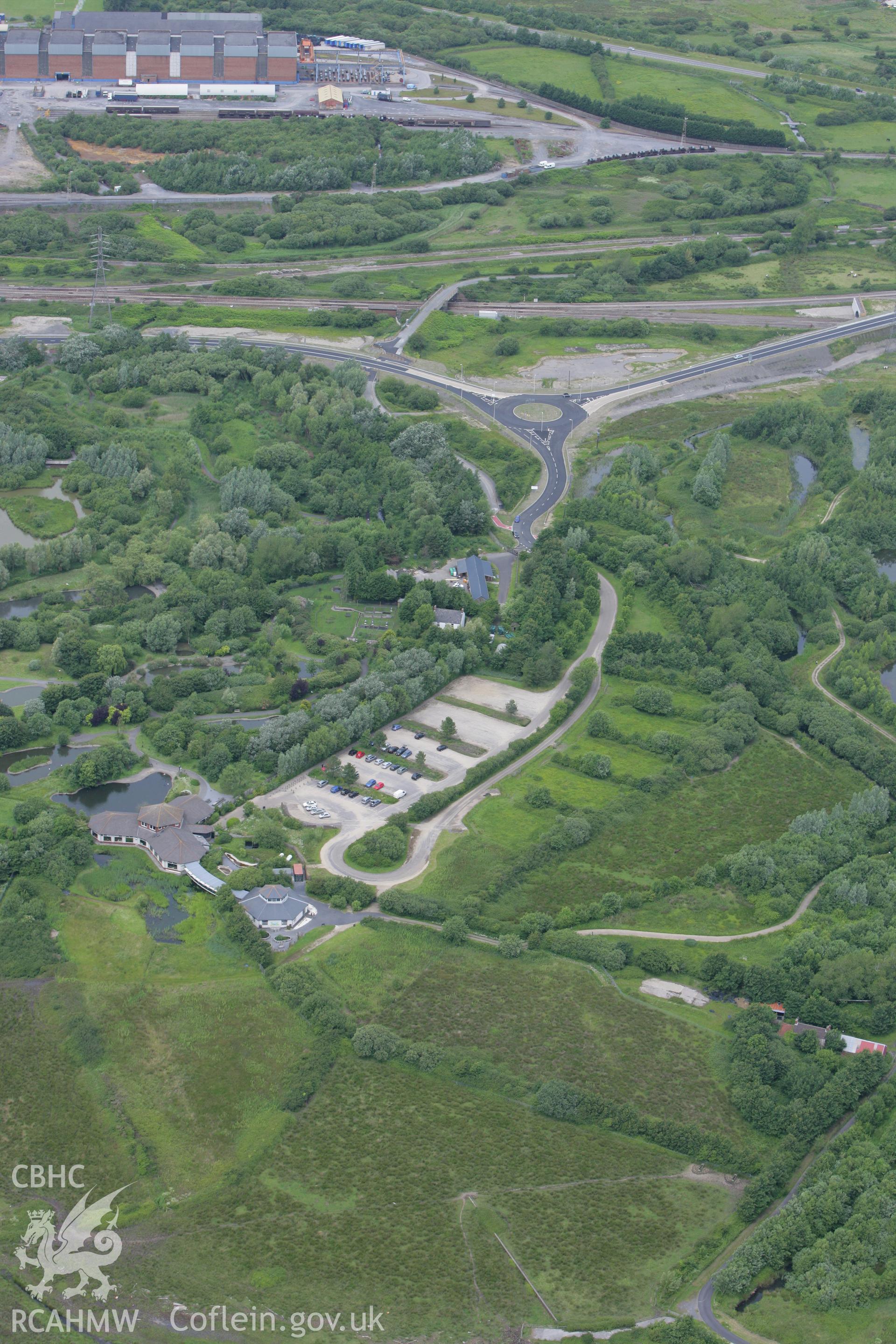 RCAHMW colour oblique photograph of Wildfowl and Wetlands Trust National Wetlands Centre, Llanelli. Taken by Toby Driver on 20/06/2008.