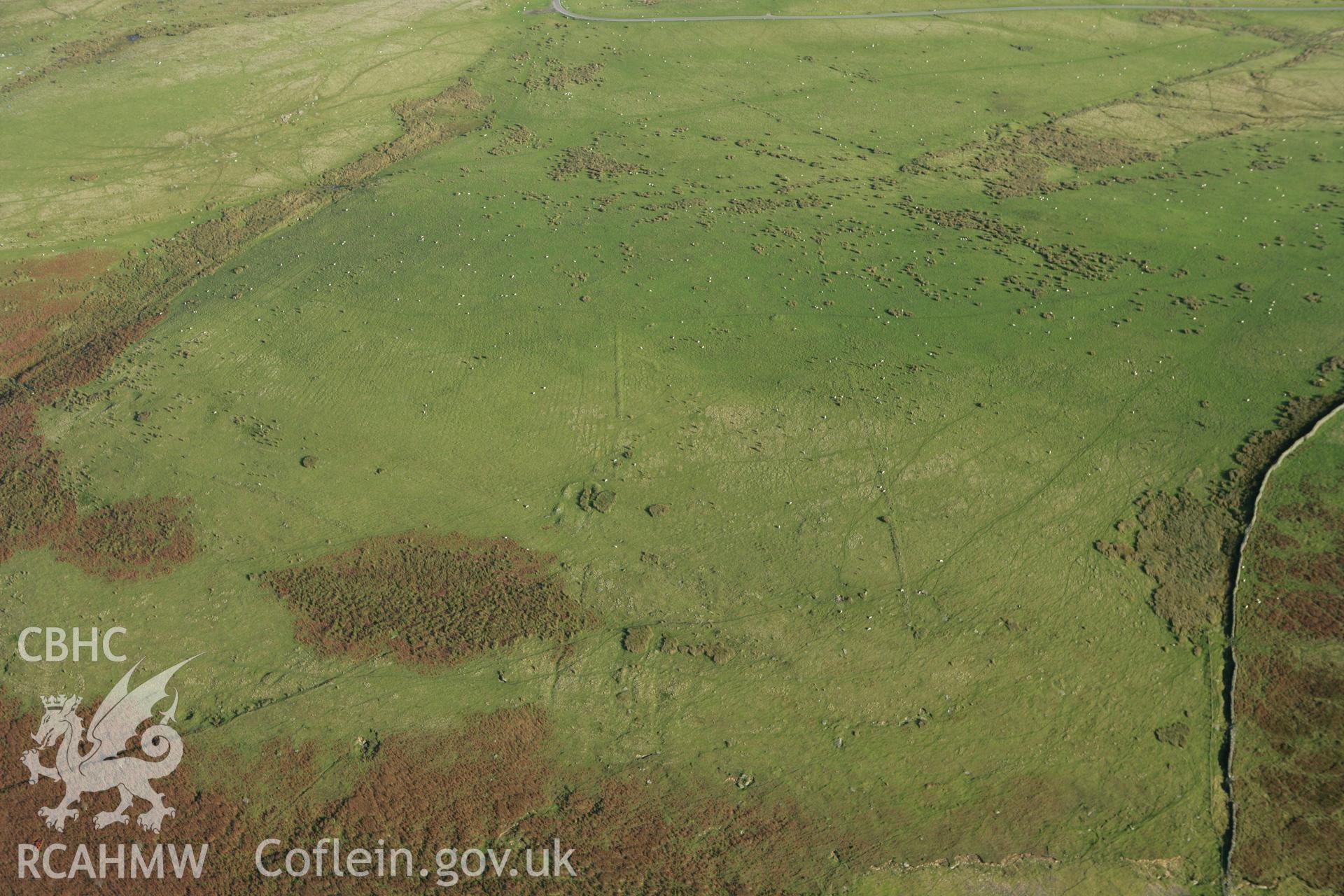 RCAHMW colour oblique photograph of Coly Uchaf Cairnfield and Dinas Noddfa Platform Houses. Taken by Toby Driver on 16/10/2008.