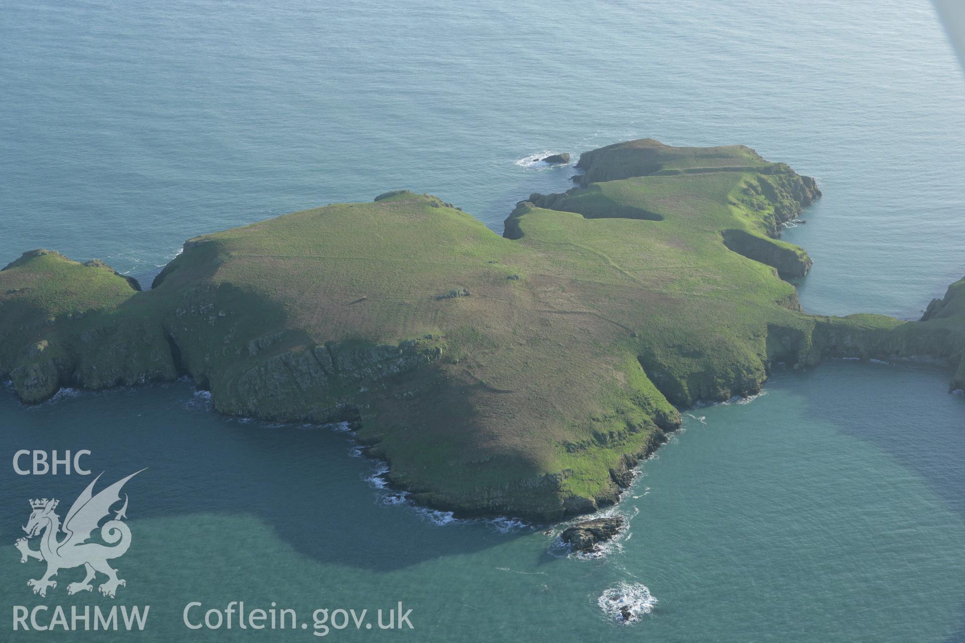 RCAHMW colour oblique photograph of South Castle Promontory fort, Skomer. Taken by Toby Driver on 04/03/2008.