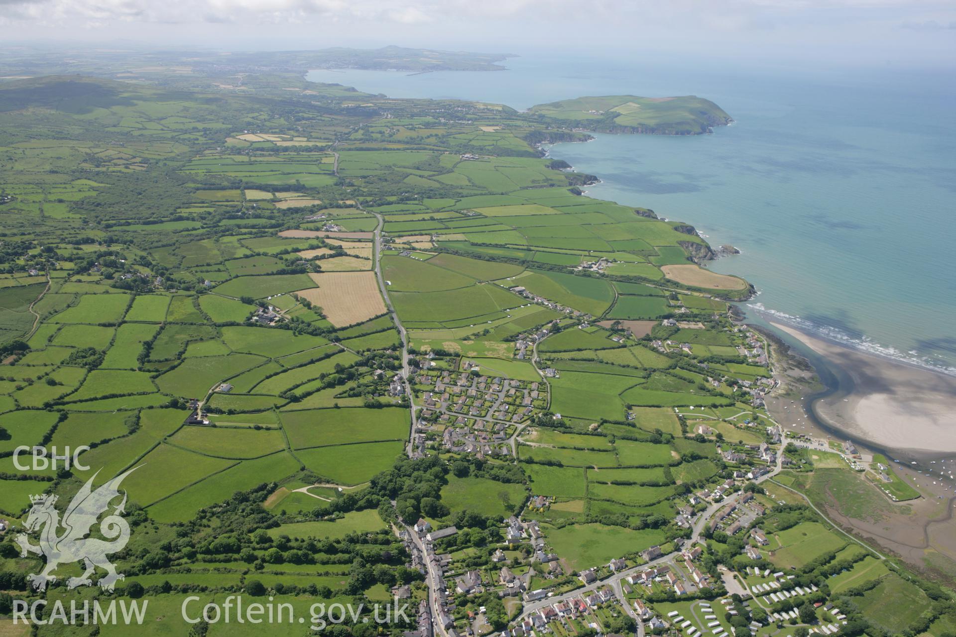 RCAHMW colour oblique photograph of coastal landscape, looking west from Newport towards Dinas Island and Strumble Head. Taken by Toby Driver on 13/06/2008.