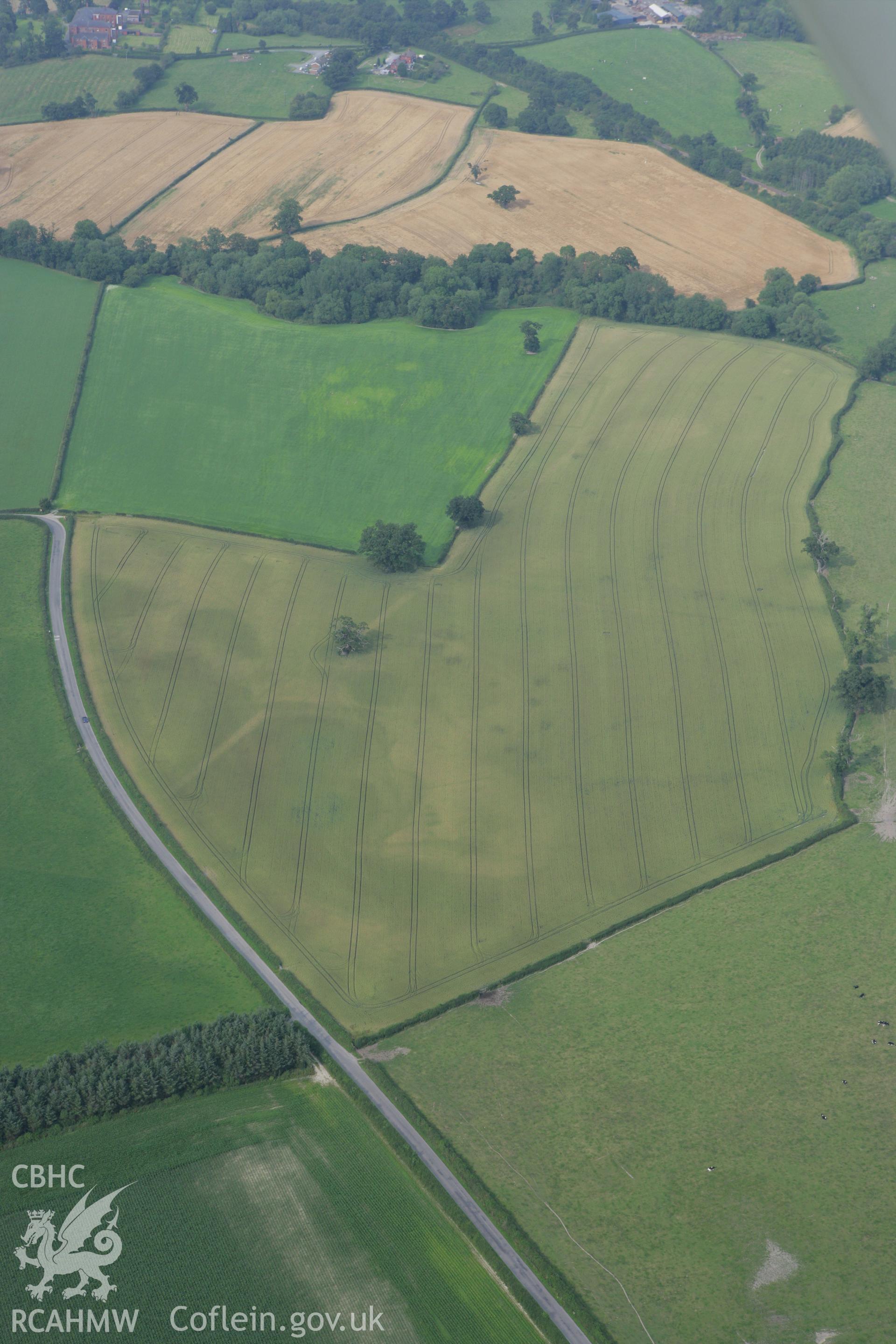 RCAHMW colour oblique photograph of Forden Gaer Roman Settlement. Taken by Toby Driver on 24/07/2008.