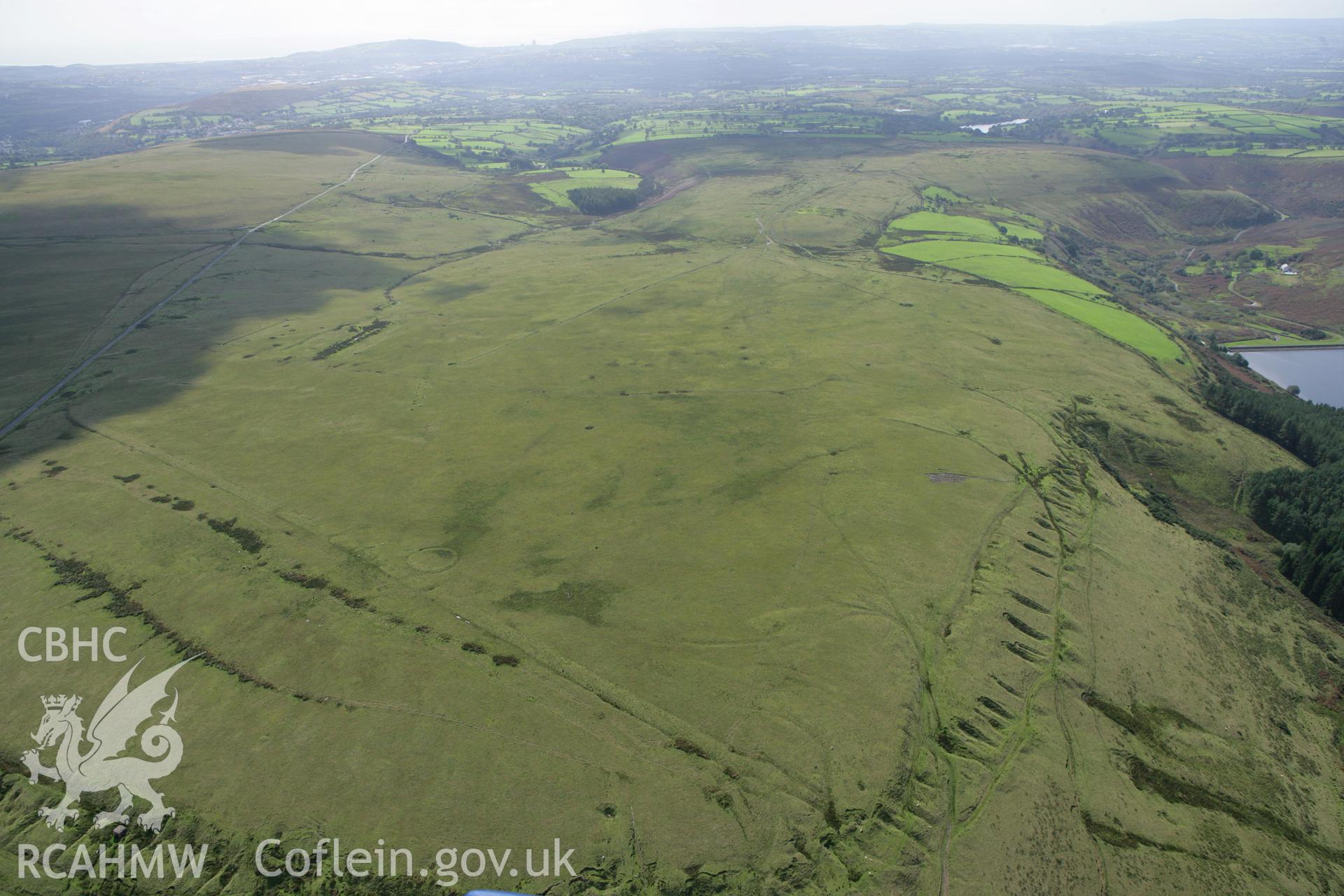 RCAHMW colour oblique photograph of Ring Cairn on Tor Clawdd (Tor Clawdd Enclosure), from the north. Taken by Toby Driver on 12/09/2008.