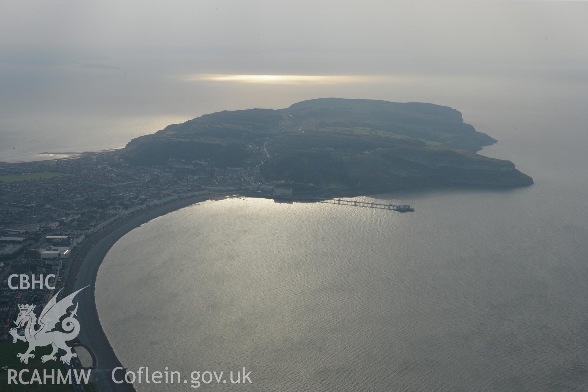 RCAHMW colour oblique photograph of Llandudno and Great Orme's Head, with Llandudno Pier, view from the east. Taken by Toby Driver on 24/07/2008.