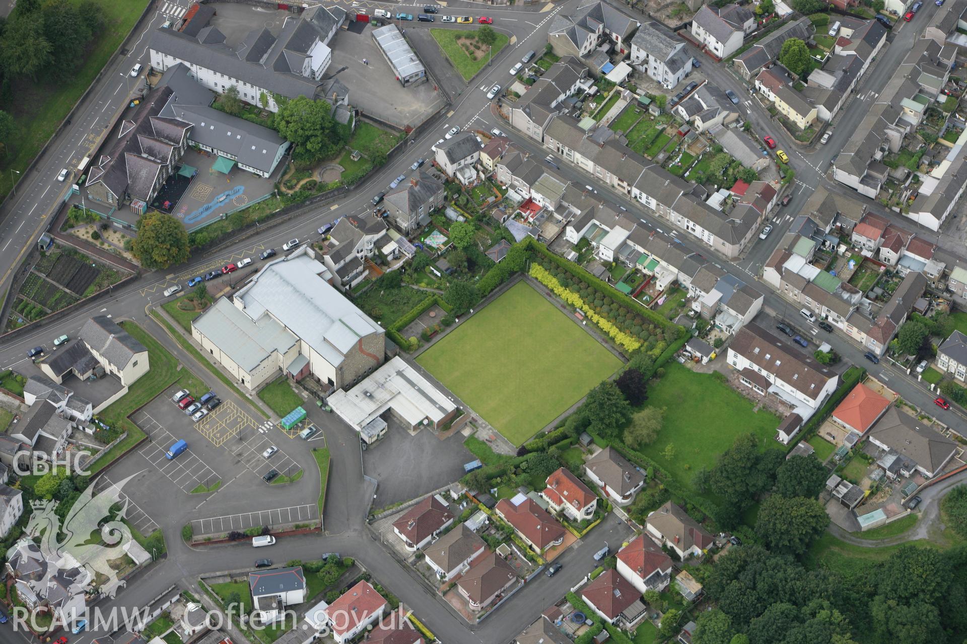 RCAHMW colour oblique photograph of the Coliseum (Miners Welfare Hall), with Comin County School, Trecynon. Taken by Toby Driver on 12/09/2008.