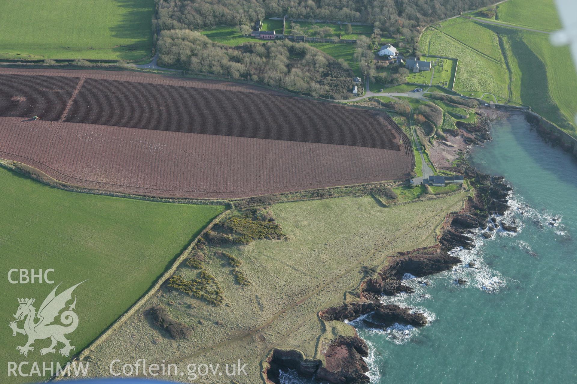 RCAHMW colour oblique photograph of St Brides, view of pillow mounds. Taken by Toby Driver on 04/03/2008.