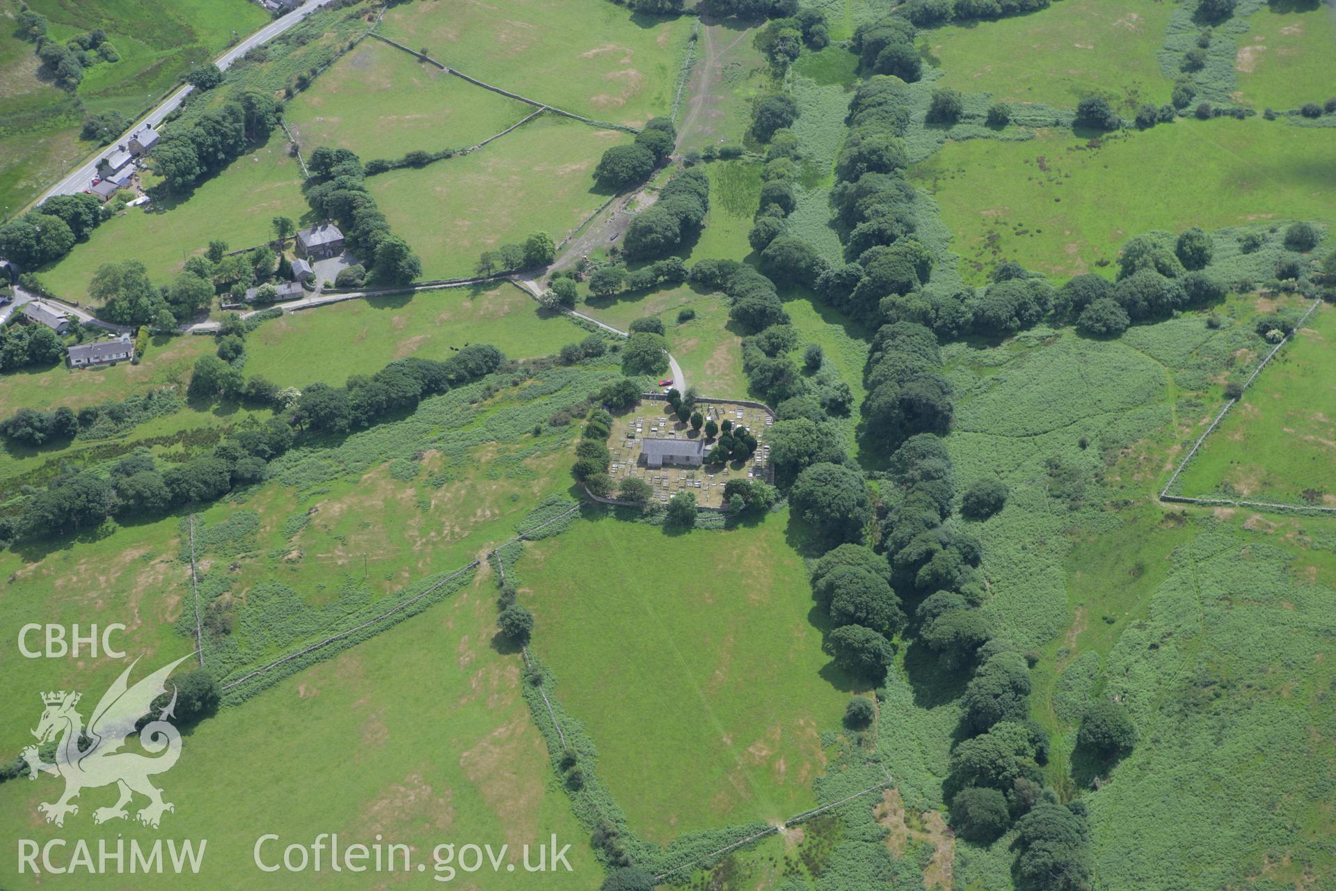 RCAHMW colour oblique photograph of St Michael's Church, with inscribed stone. Taken by Toby Driver on 13/06/2008.