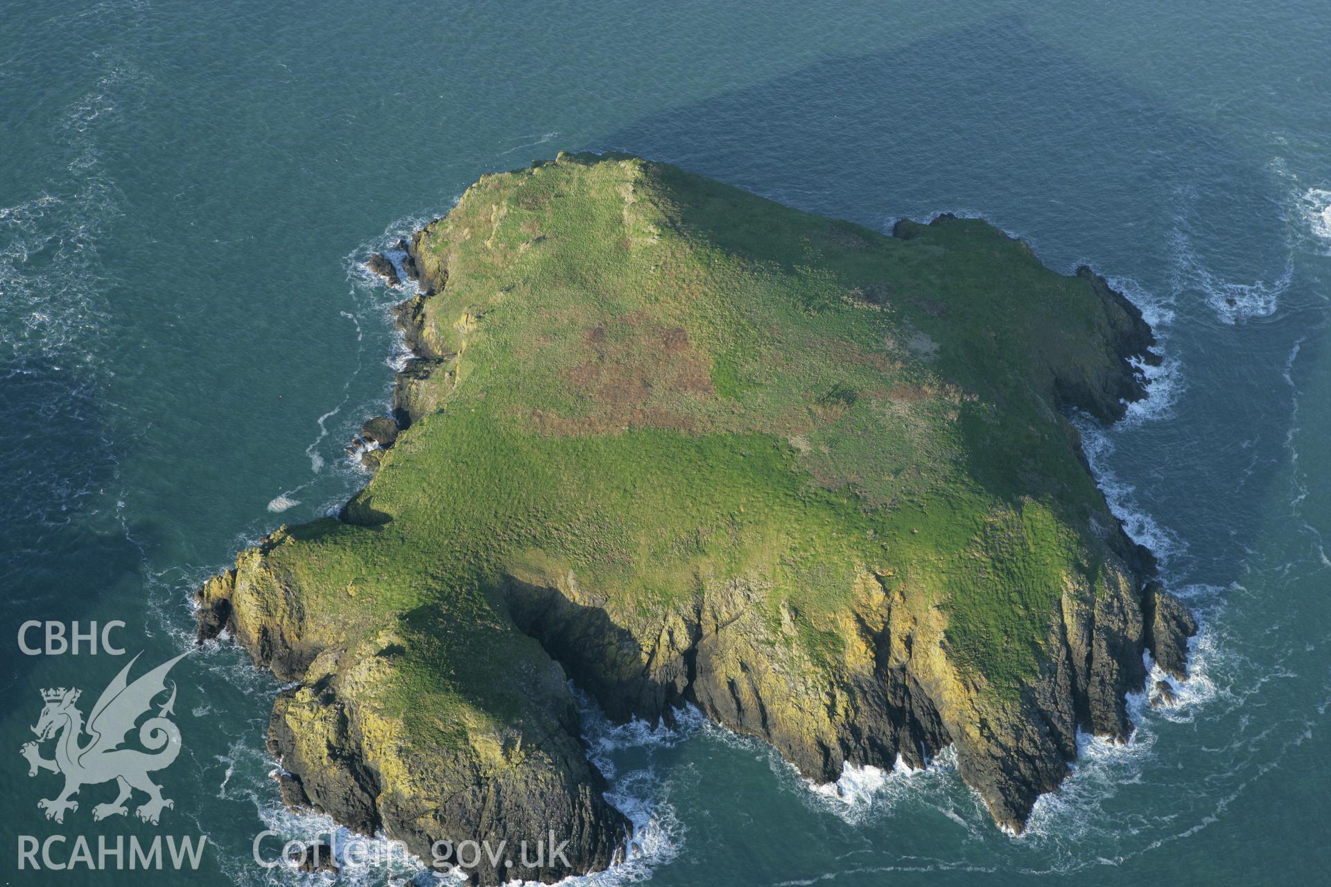 RCAHMW colour oblique photograph of Midland Isle, Skomer Island, settlement and field boundary. Taken by Toby Driver on 04/03/2008.