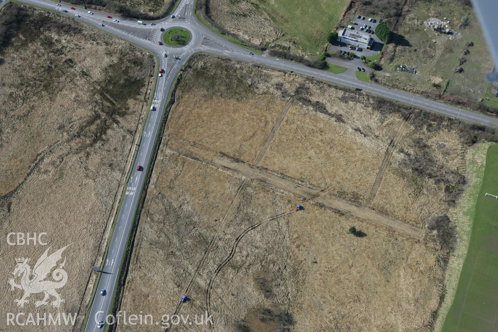 RCAHMW colour oblique photograph of Roman Military Enclosure on Stafford Common, Gowerton. Taken by Toby Driver on 04/03/2008.