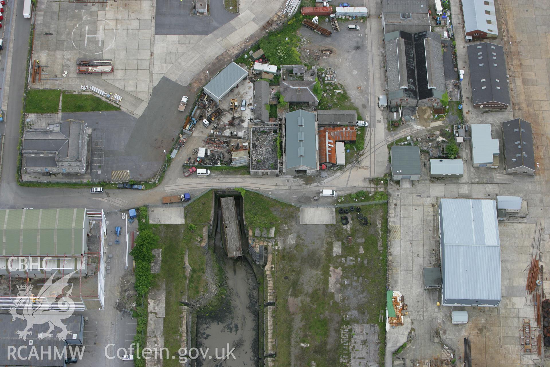 RCAHMW colour oblique photograph of Dry Dock, Pembroke Dockyard. Taken by Toby Driver on 20/06/2008.