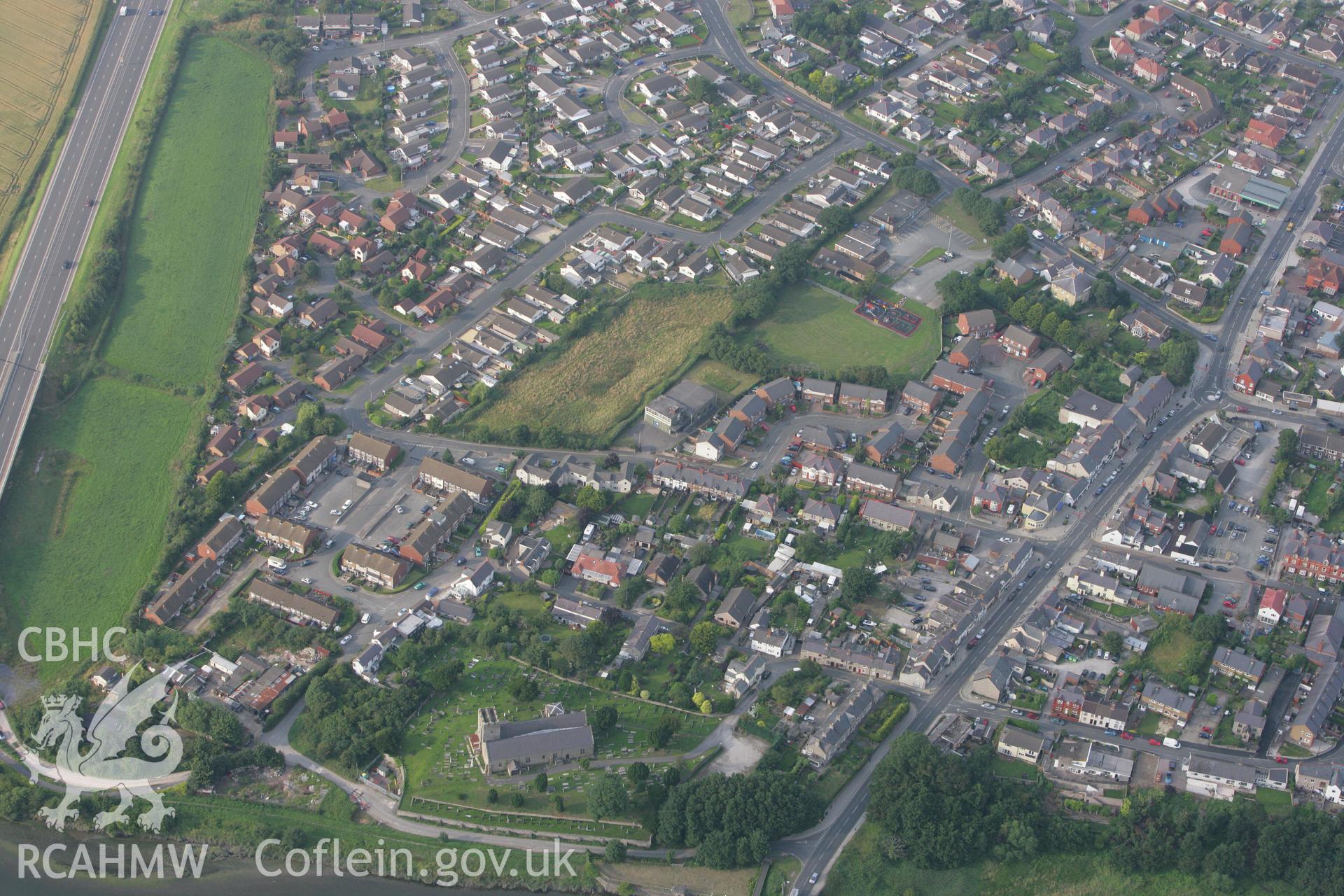 RCAHMW colour oblique photograph of Rhuddlan, looking north-east towards Edwardian town defences. Taken by Toby Driver on 24/07/2008.