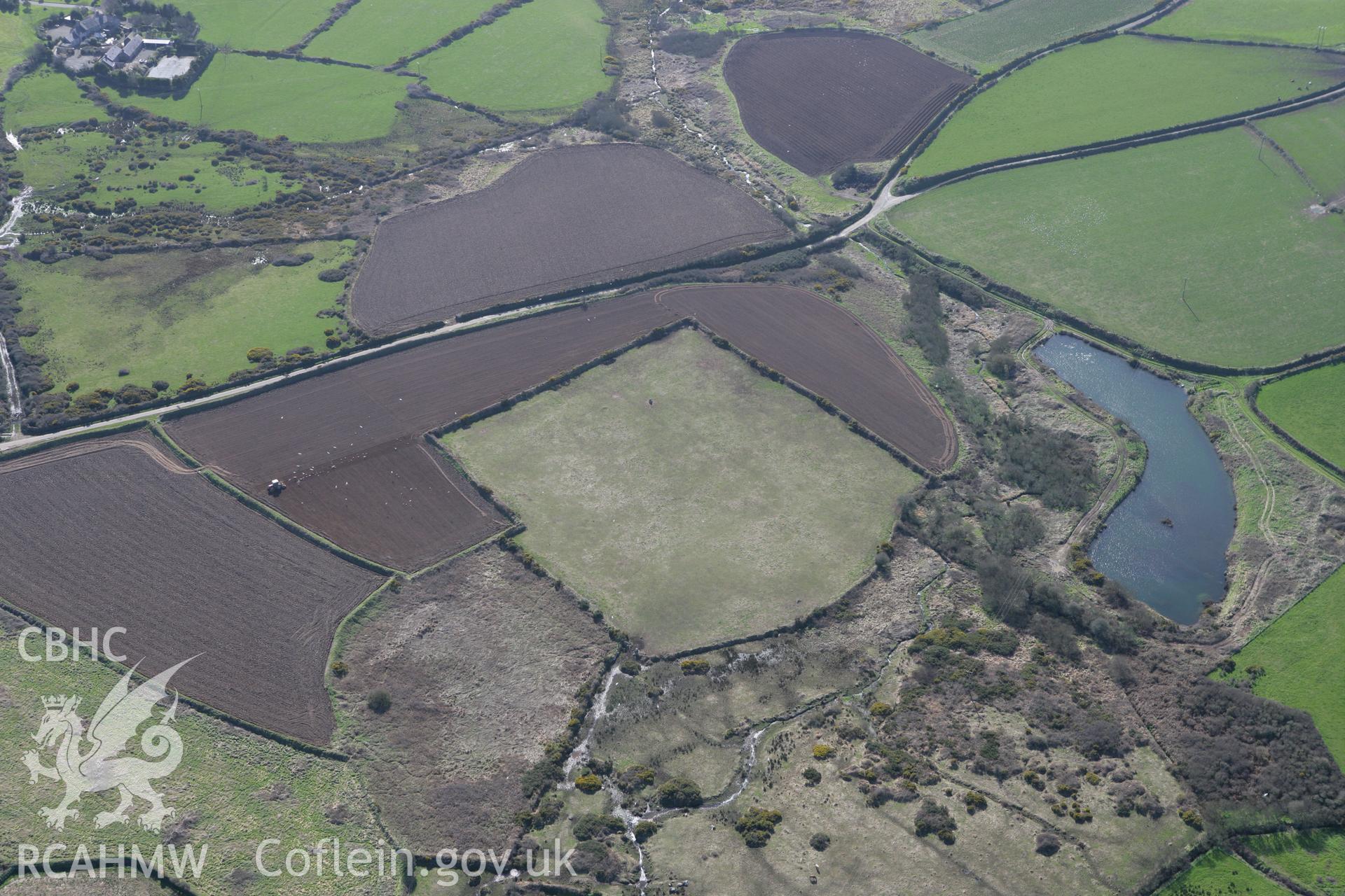 RCAHMW colour oblique photograph of possible Roman Fort, Trepewet. Taken by Toby Driver on 04/03/2008.