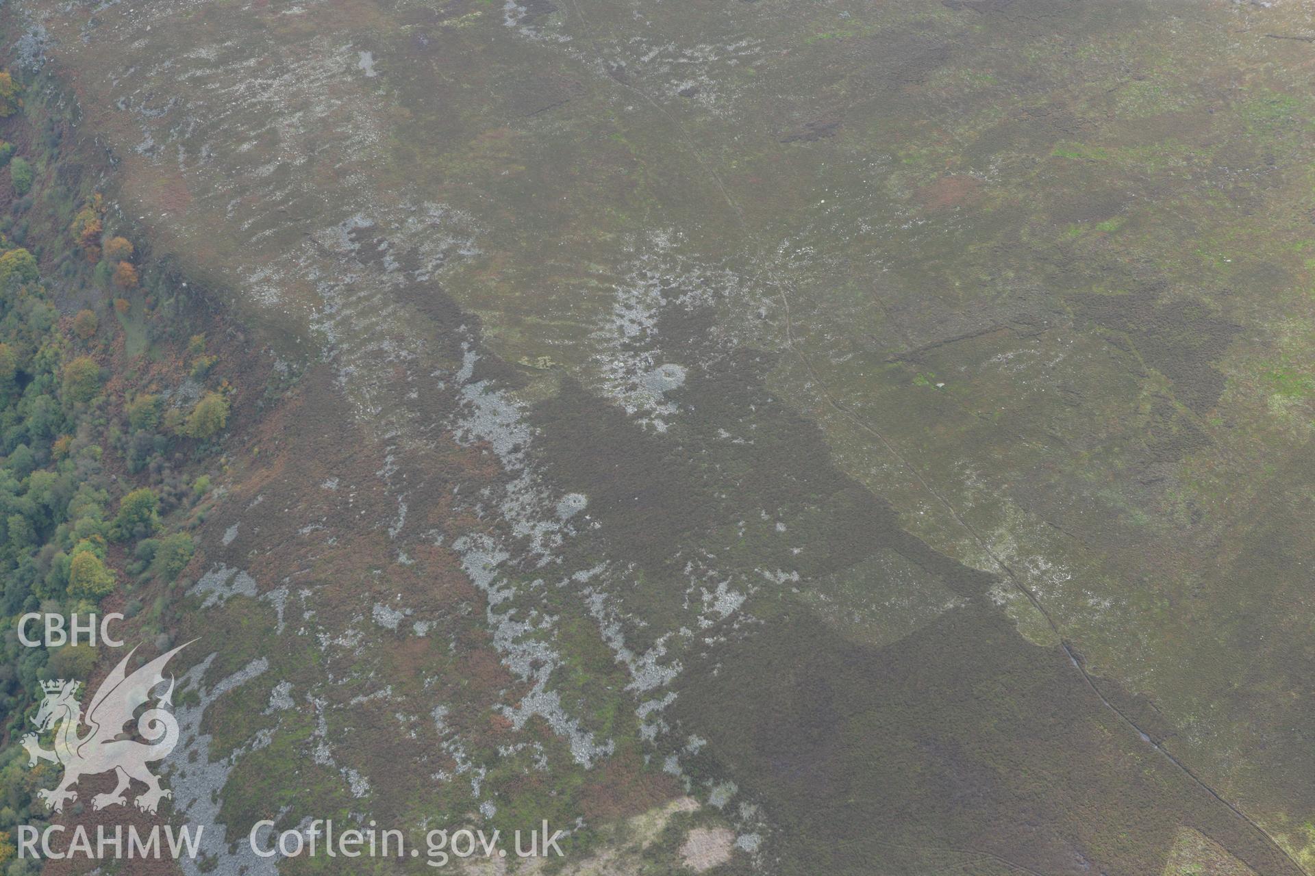 RCAHMW colour oblique photograph of Cefn-y-defaid Cairns (N and S). Taken by Toby Driver on 10/10/2008.