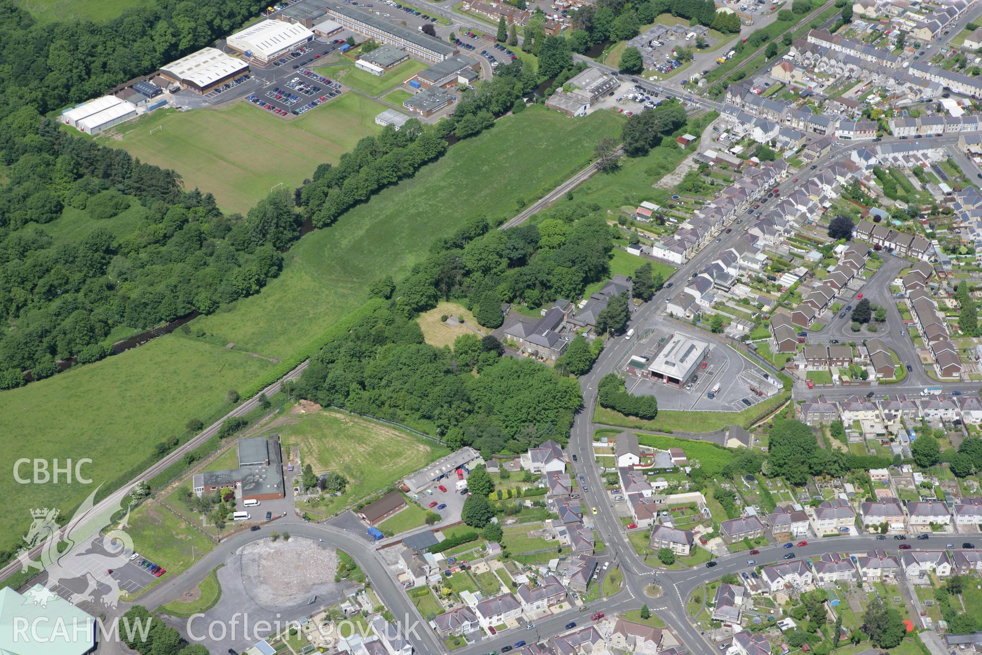 RCAHMW colour oblique photograph of Tir-y-dail Motte and Bailey, Ammanford. Taken by Toby Driver on 09/06/2008.