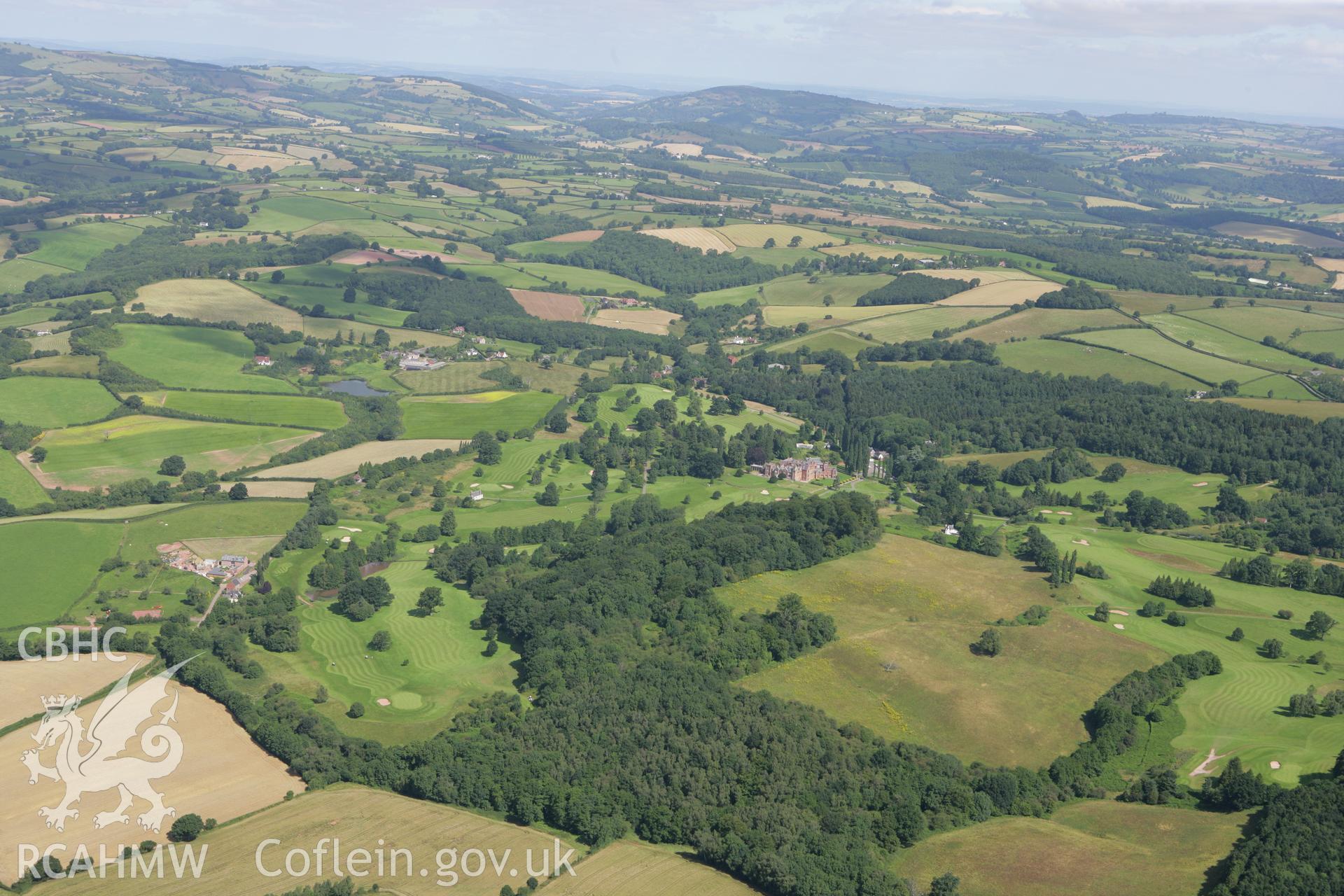 RCAHMW colour oblique photograph of landscape looking south over The Hendre house and gardens. Taken by Toby Driver on 21/07/2008.