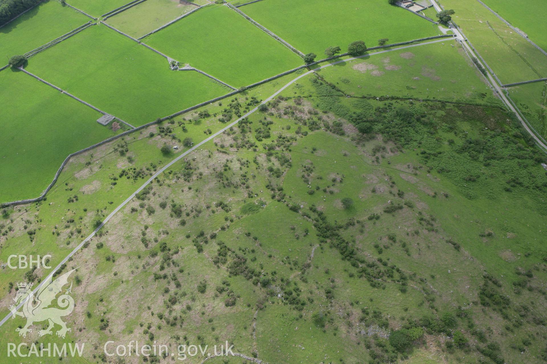 RCAHMW colour oblique photograph of Cors-y-Gedol Burial Chamber, Settlements and Field System. Taken by Toby Driver on 13/06/2008.