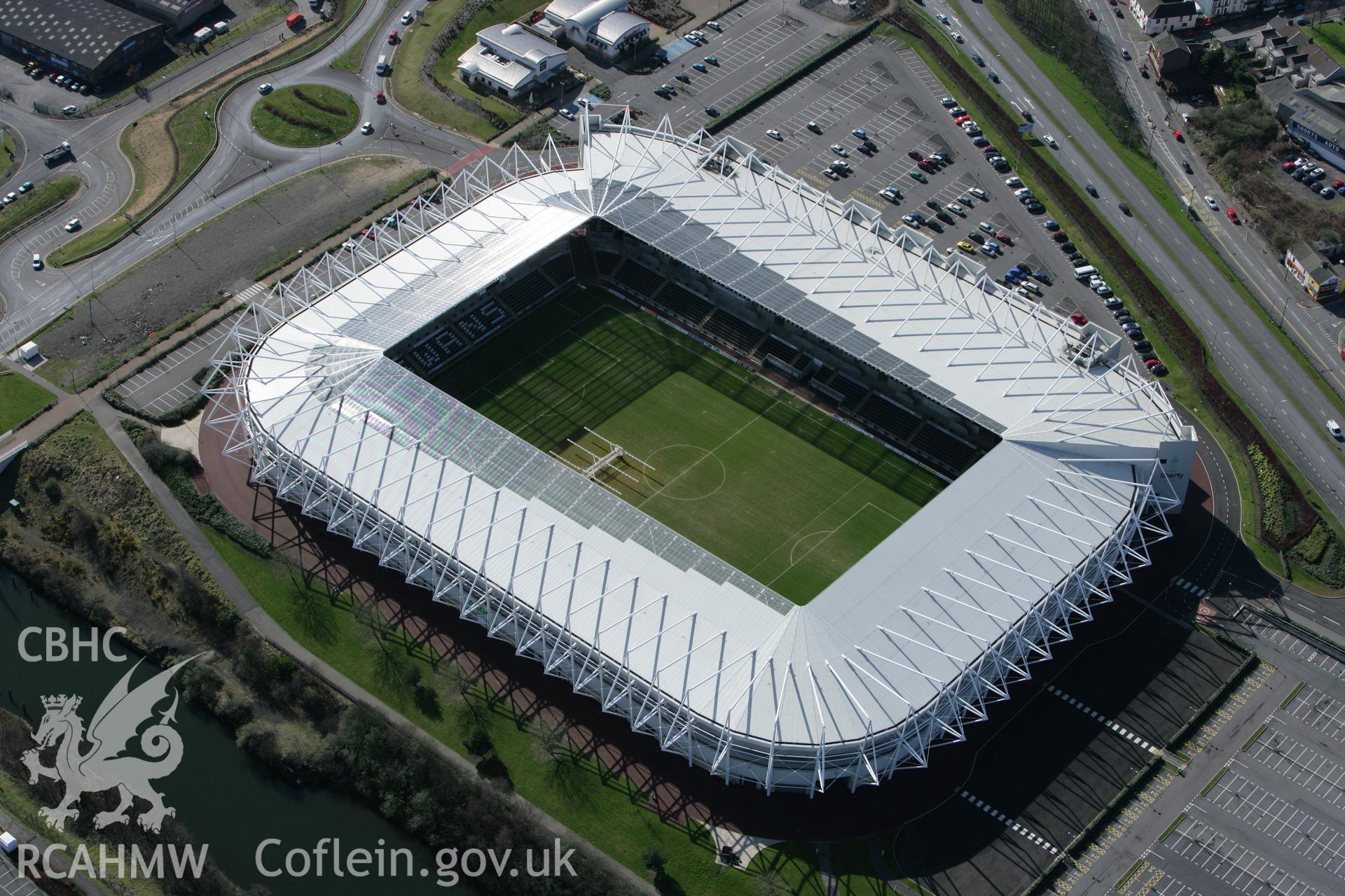 RCAHMW colour oblique aerial photograph of Morfa Stadium Sports Ground, Swansea, viewed from the north-east. Taken on 04 March 2008 by Toby Driver