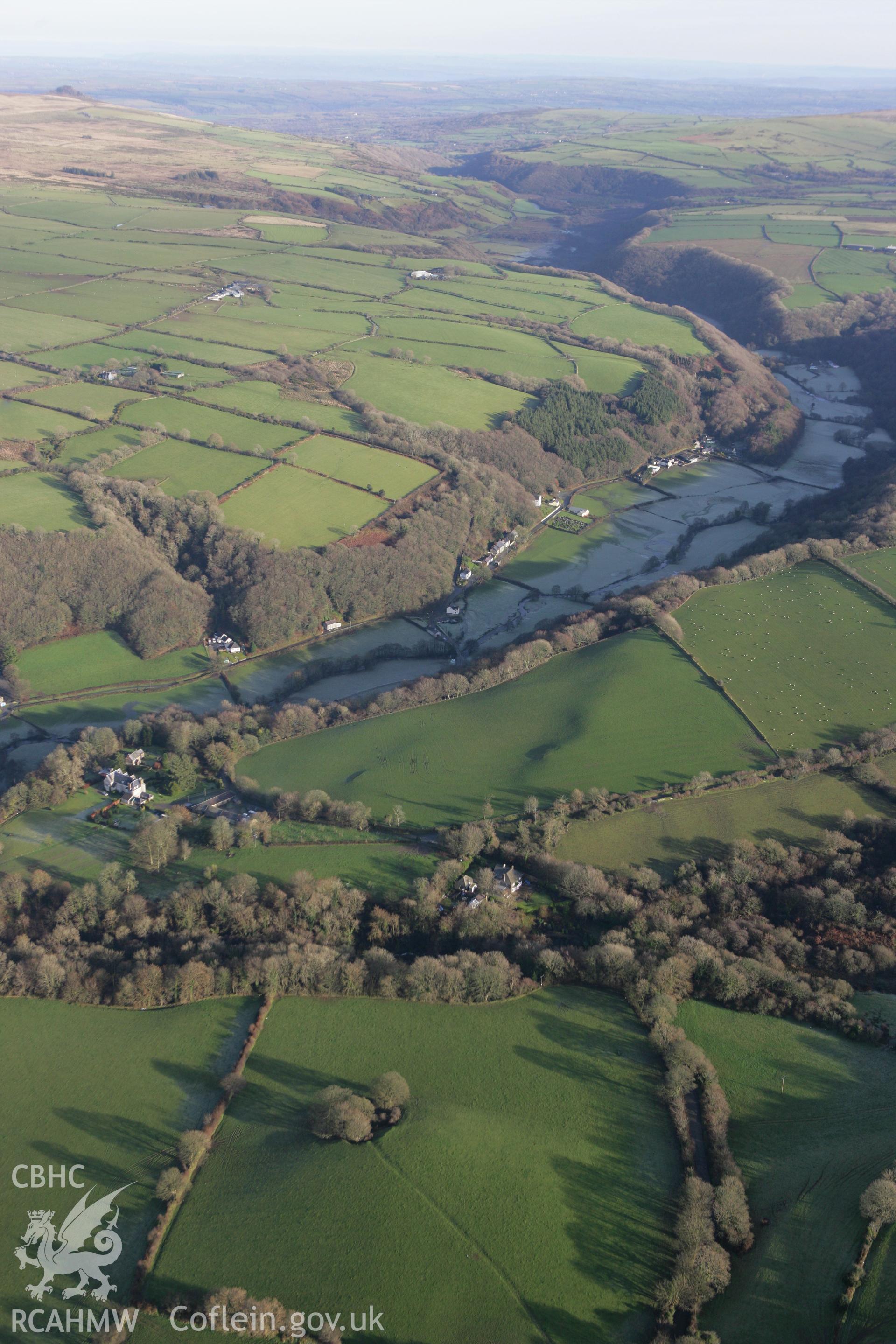 RCAHMW colour oblique photograph of St Brynach's Church (Pontfaen Church) and Pontfaen Farm. Taken by Toby Driver on 15/12/2008.