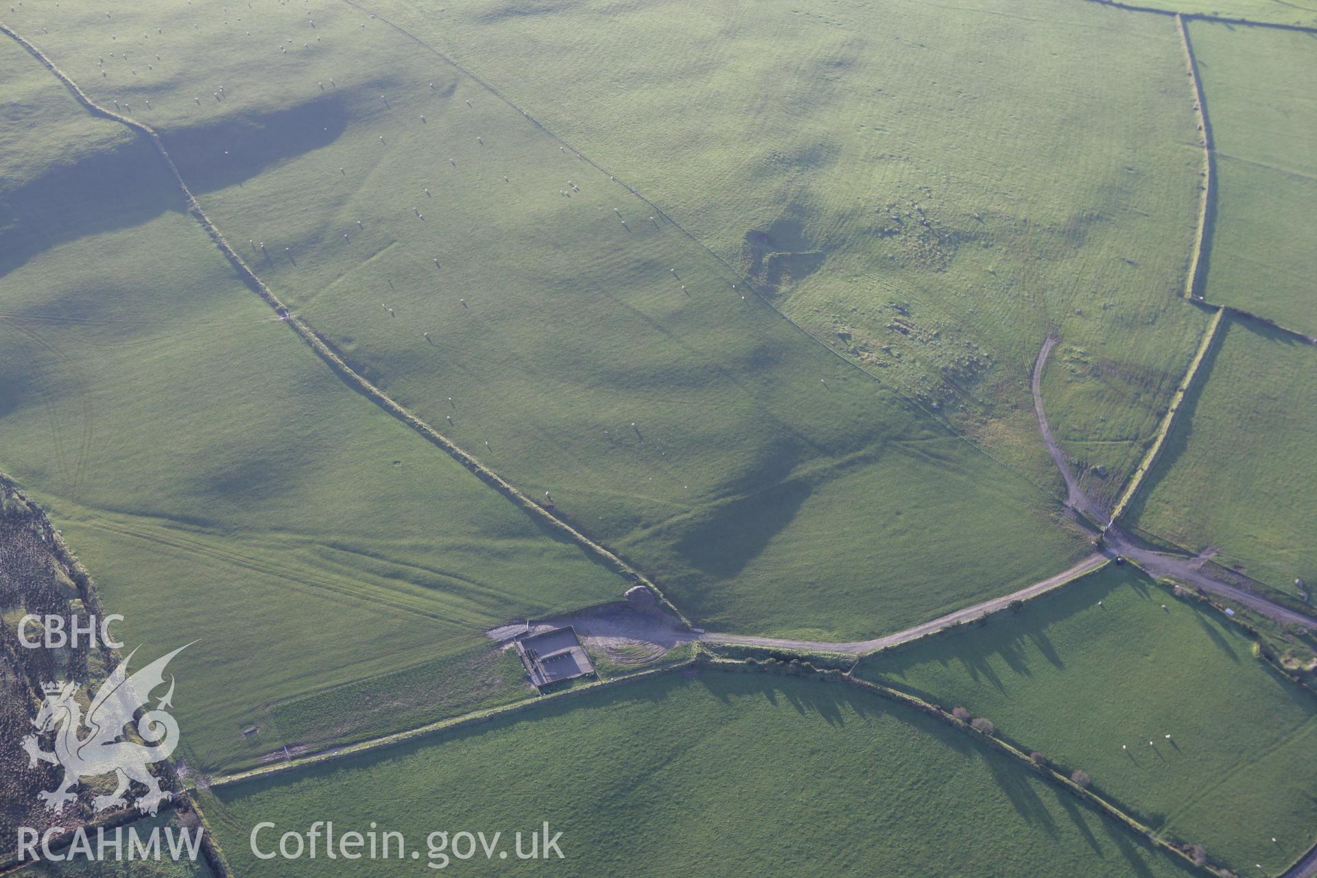 RCAHMW colour oblique photograph of fields to the south of Trefach Promontory Fort. Taken by Toby Driver on 15/12/2008.