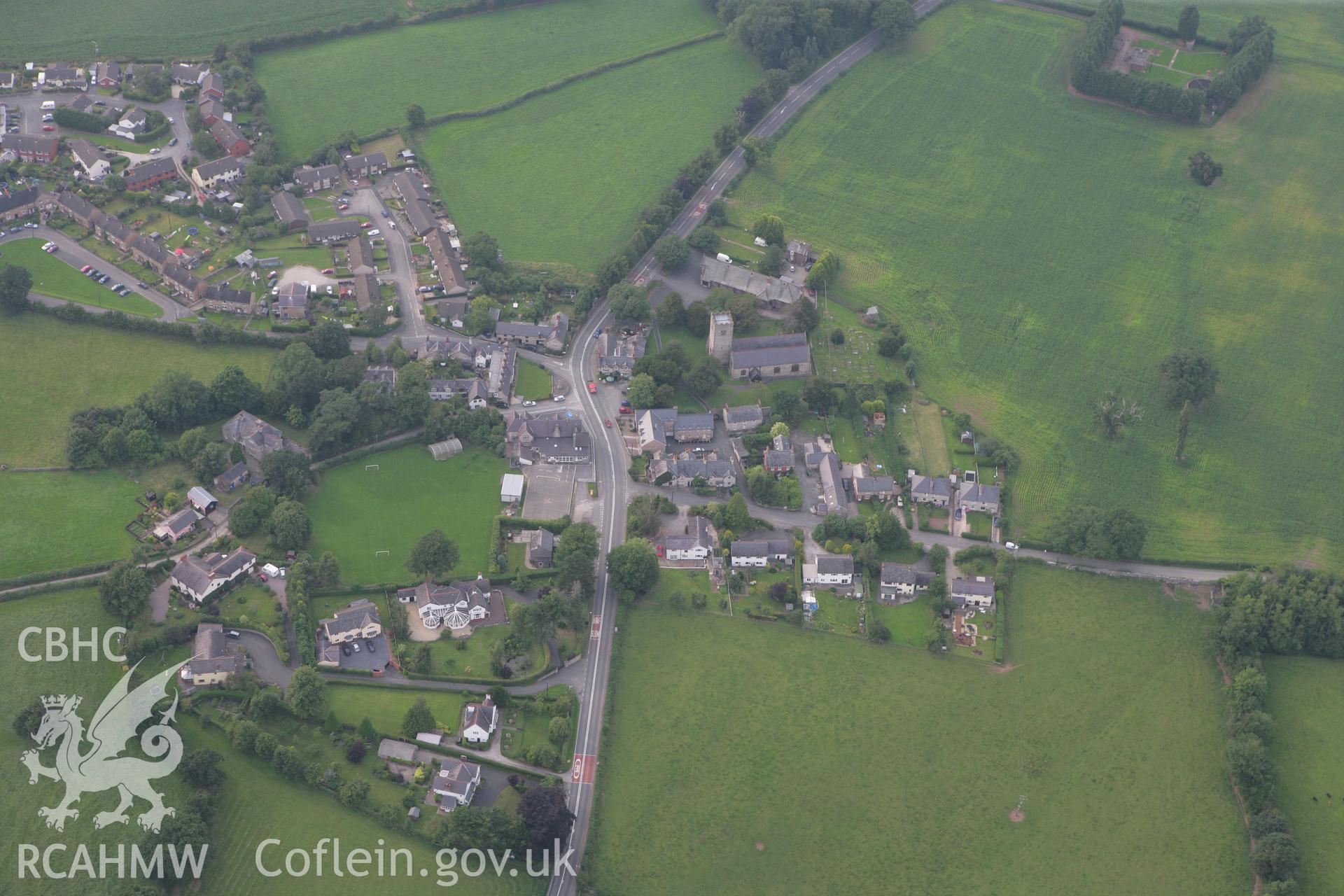 RCAHMW colour oblique photograph of Llanfair Dyffryn Clwyd village, with St Cynfarch and St Mary's Chruch. Taken by Toby Driver on 24/07/2008.