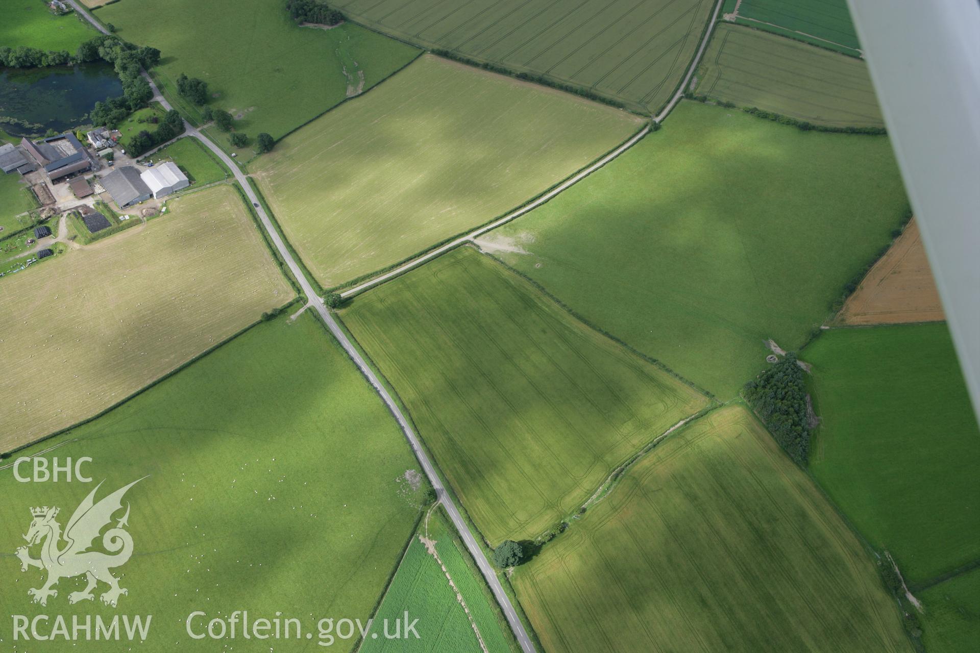 RCAHMW colour oblique photograph of Hindwell Palisaded Enclosure and Roman Camp II. Taken by Toby Driver on 21/07/2008.