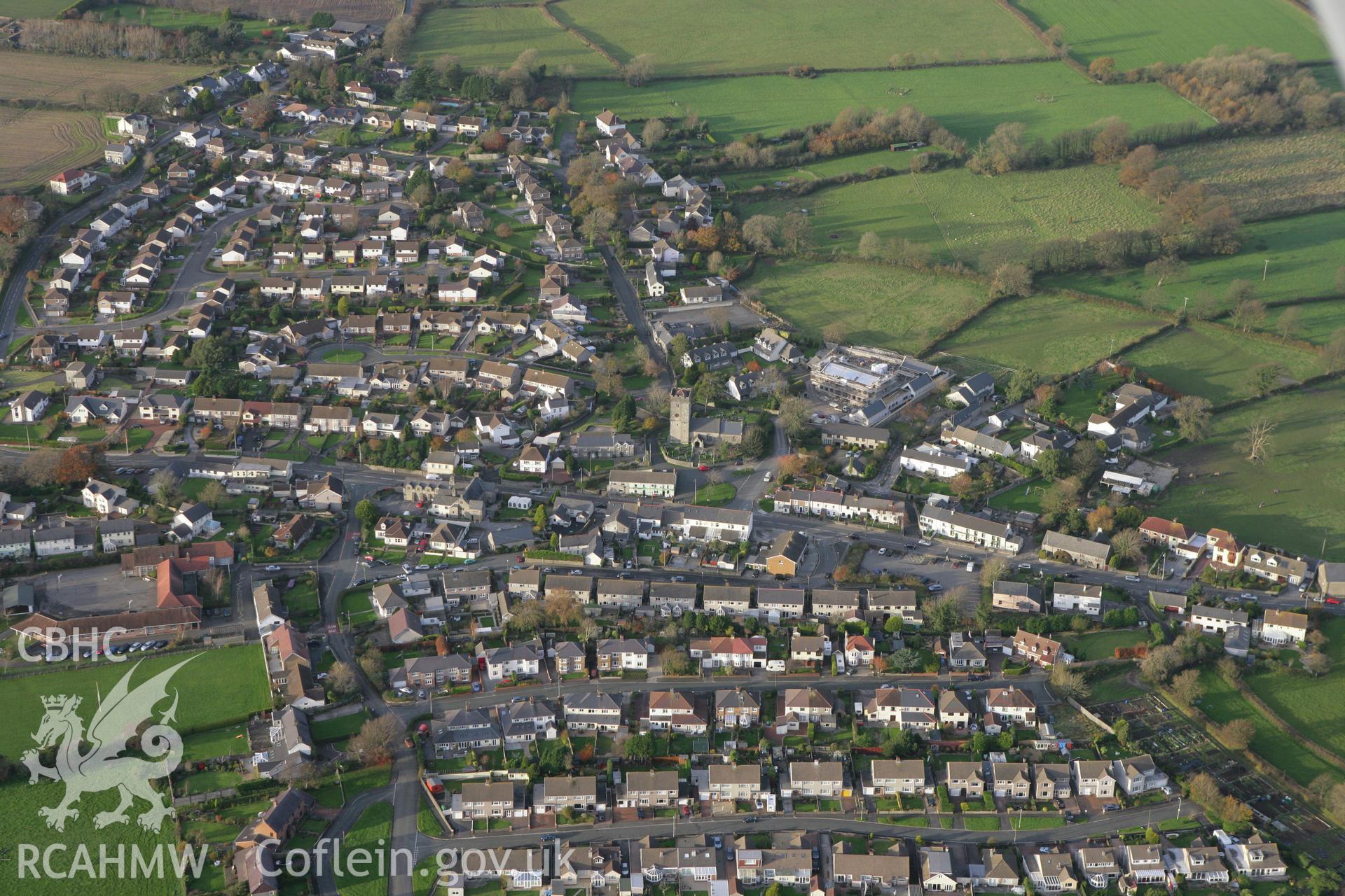 RCAHMW colour oblique photograph of Laleston village with St David's Church. Taken by Toby Driver on 12/11/2008.