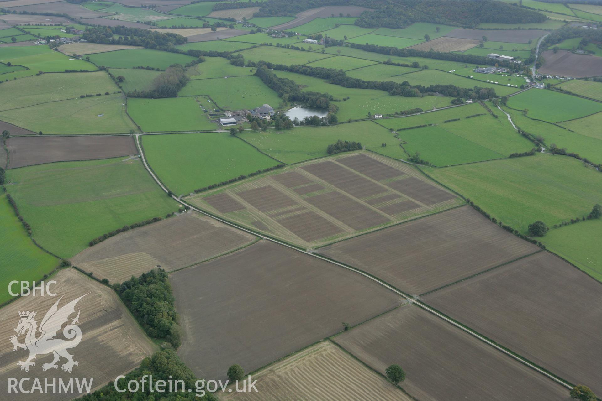 RCAHMW colour oblique photograph of Hindwell Farm Barrow II and the Hindwell Palisaded Enclosure. Taken by Toby Driver on 10/10/2008.