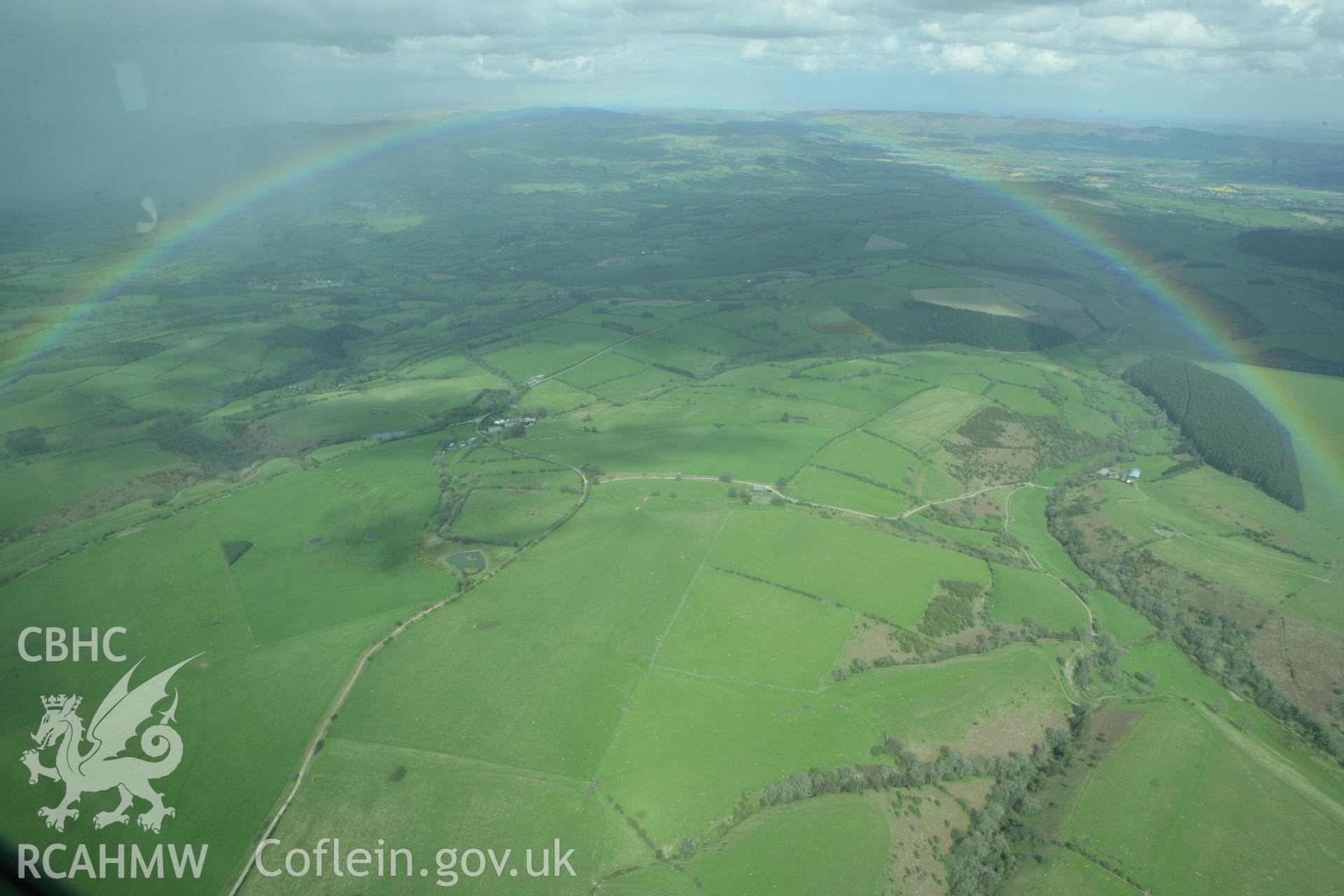 RCAHMW colour oblique photograph of landscape looking north-east towards Mellington Hill Round Barrow. Taken by Toby Driver on 02/05/2008.