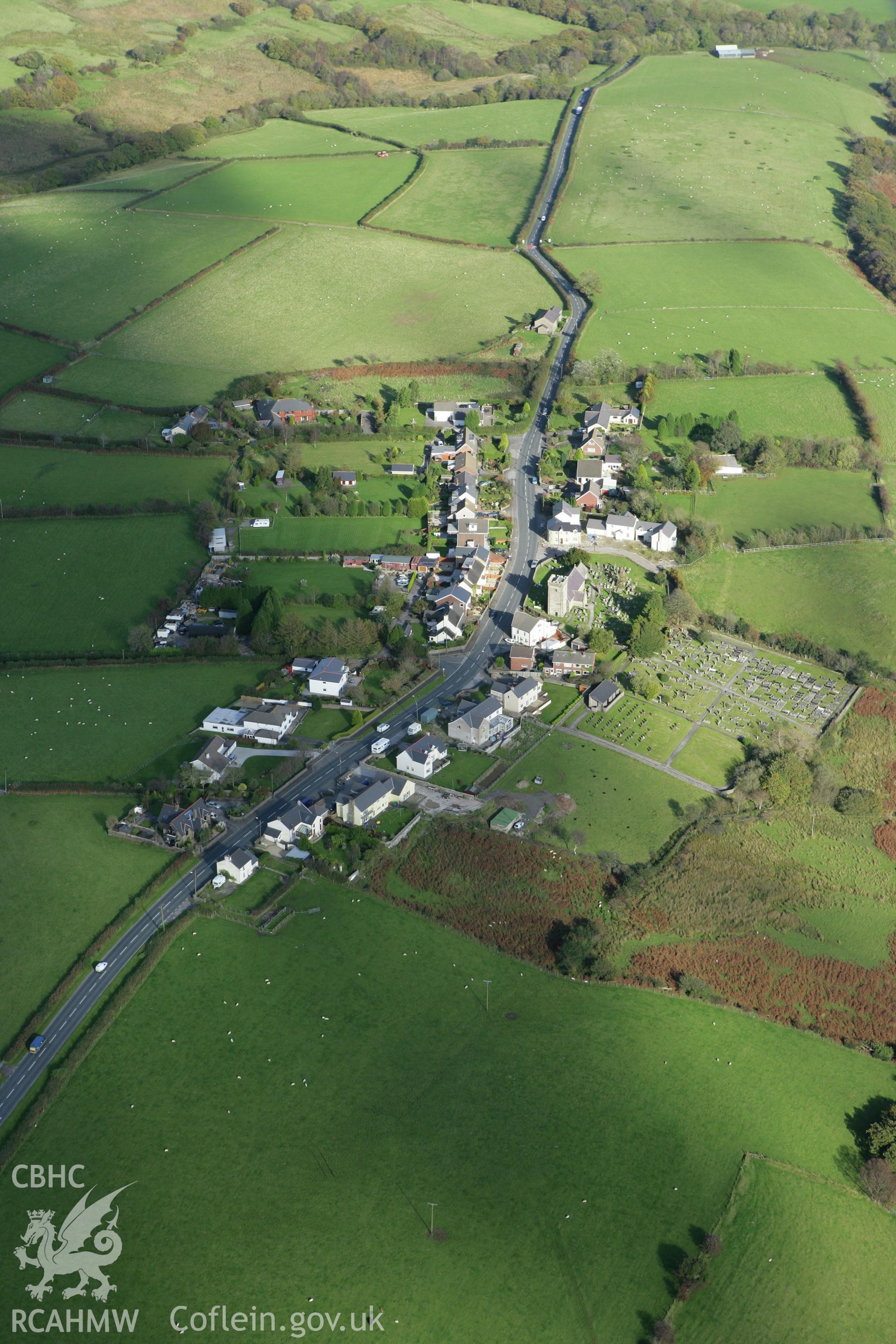 RCAHMW colour oblique photograph of Glynogwr village, with St Tyfodwg's Church. Taken by Toby Driver on 16/10/2008.