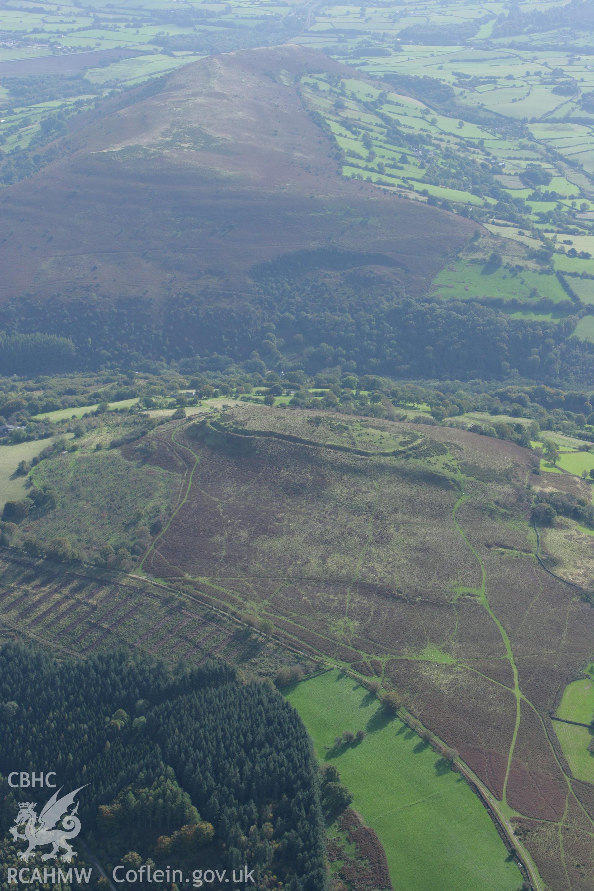 RCAHMW colour oblique photograph of Twyn-y-gaer Camp, from the north. Taken by Toby Driver on 10/10/2008.