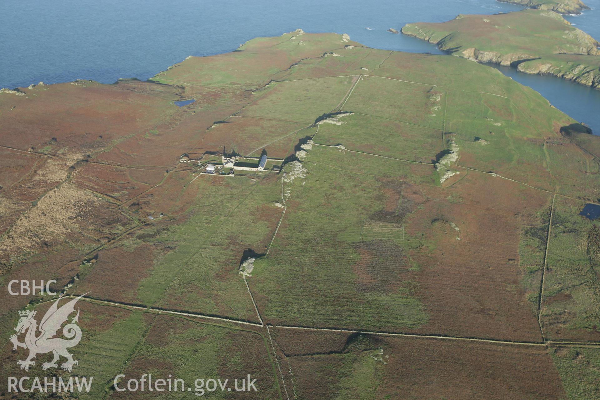 RCAHMW colour oblique photograph of Skomer Island Old Farm, view from west. Taken by Toby Driver on 04/03/2008.