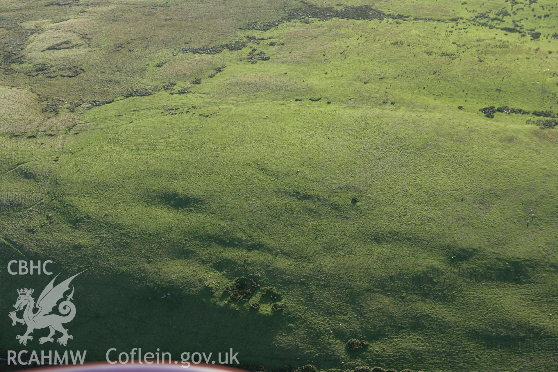 RCAHMW colour oblique photograph of Pant Ffosyrhebog Cairn, with Gelligaer Common House Platforms. Taken by Toby Driver on 16/10/2008.