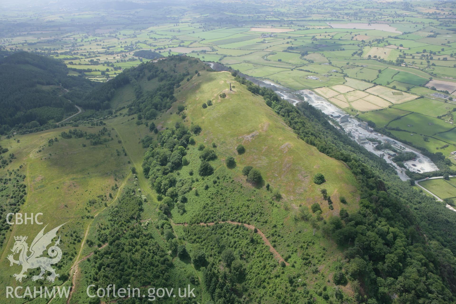 RCAHMW colour oblique photograph of Breddin Hillfort, with Breddin quarry. Taken by Toby Driver on 01/07/2008.