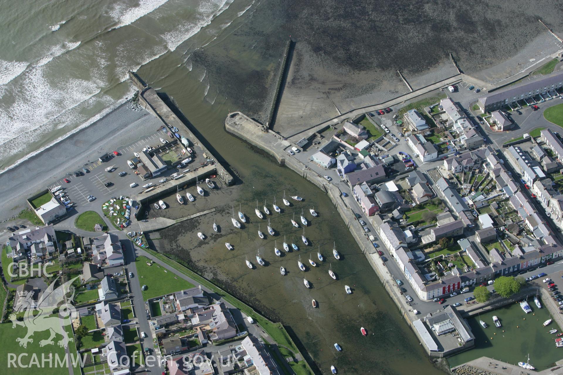 RCAHMW colour oblique photograph of Aberaeron Harbour and adjacent housing, Aberaeron. Taken by Toby Driver on 24/04/2008.