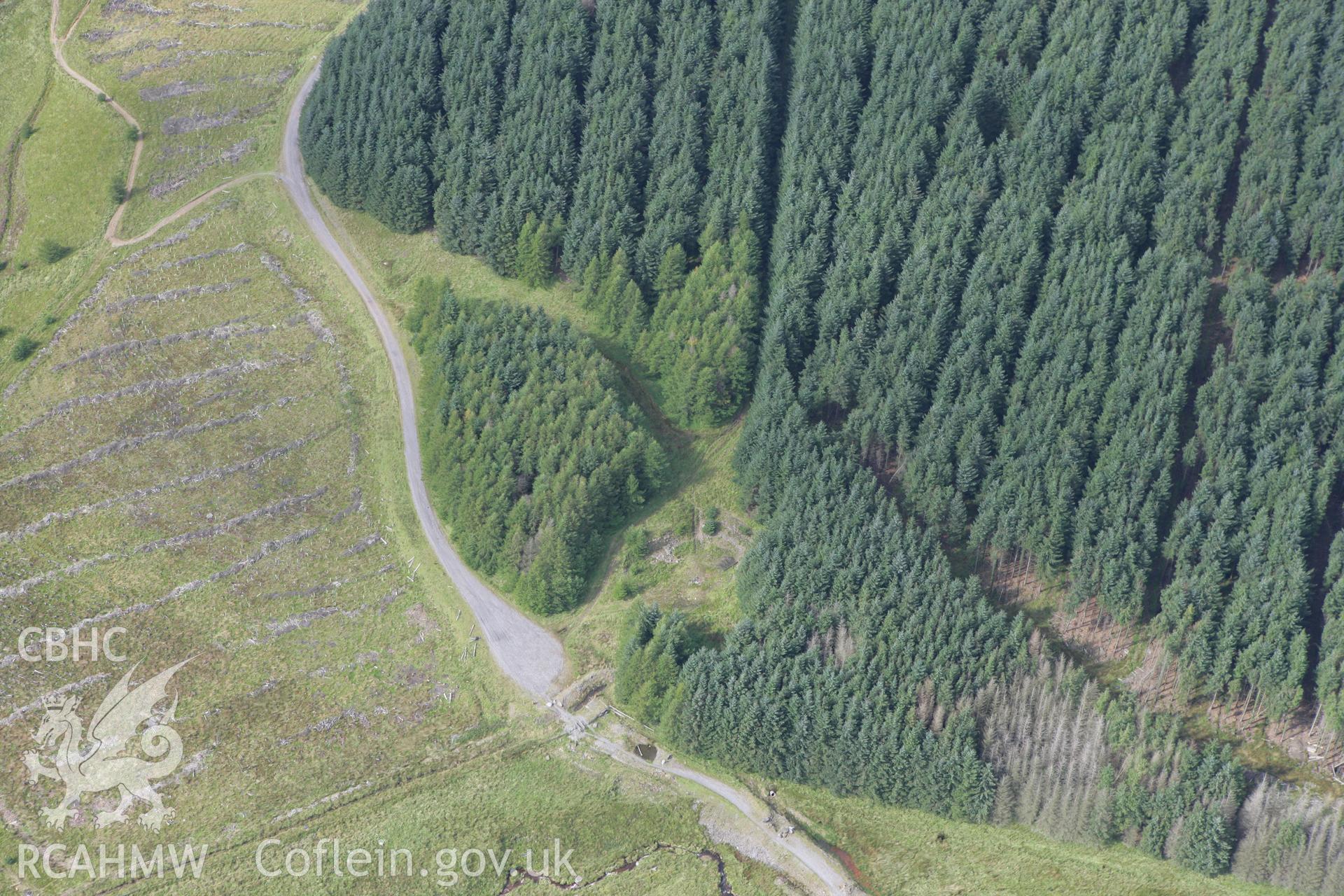 RCAHMW colour oblique photograph of Rhondda Fach Cairn (under forestry). Taken by Toby Driver on 12/09/2008.