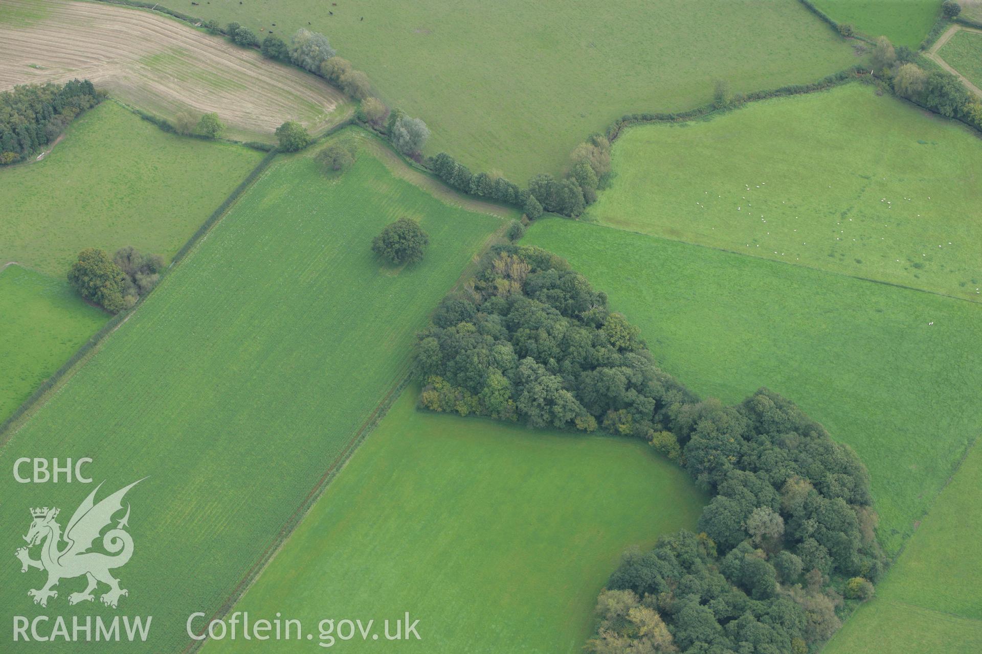 RCAHMW colour oblique photograph of Lower House Farm Moat. Taken by Toby Driver on 10/10/2008.