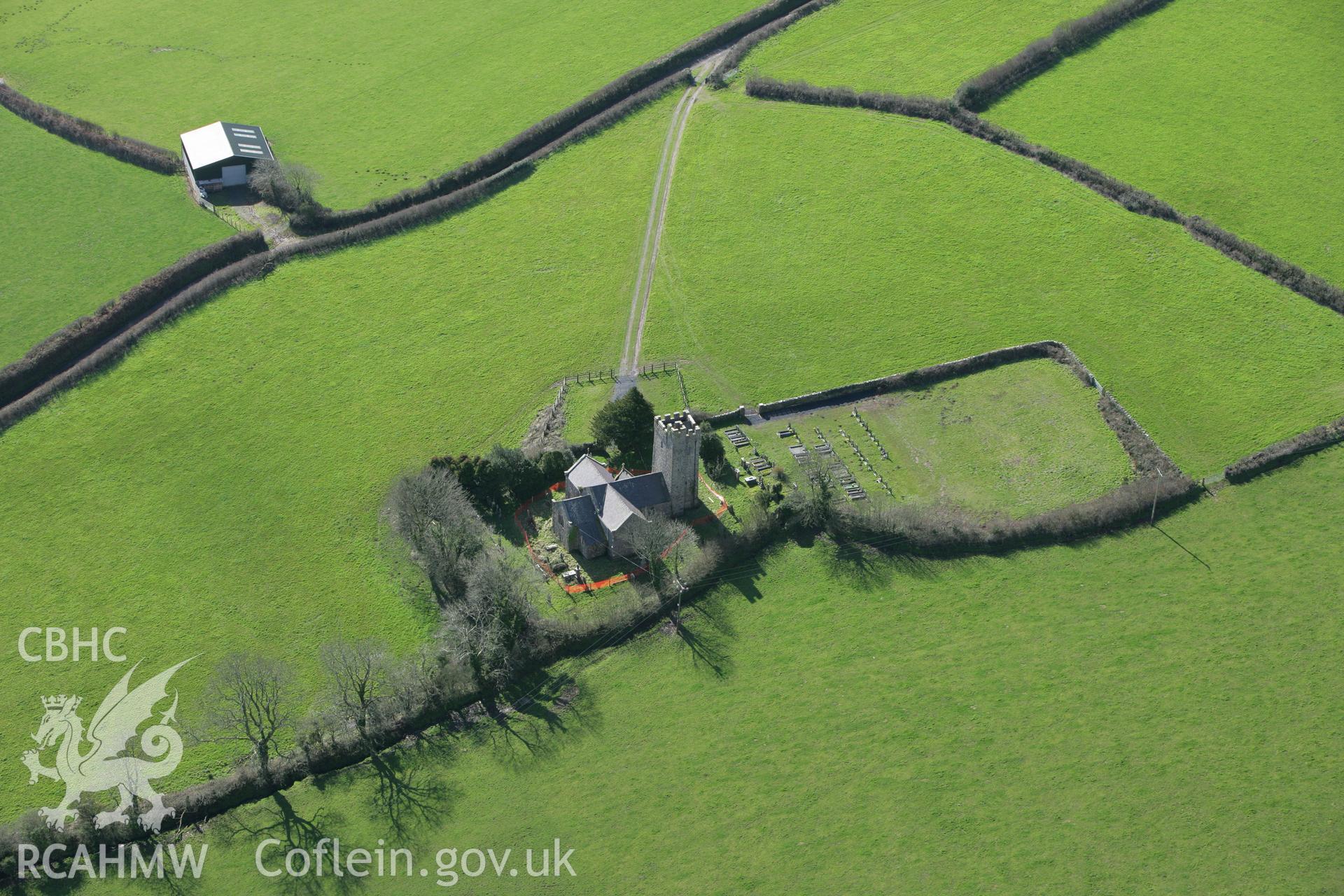 RCAHMW colour oblique aerial photograph of St Elidyr's Church, Crunwere, from the north-east. Taken on 04 March 2008 by Toby Driver