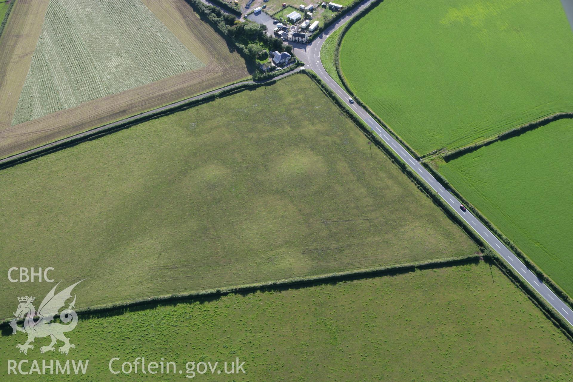 RCAHMW colour oblique aerial photograph of Dry Burrows Barrow Group near Hundleton. Taken on 30 July 2007 by Toby Driver