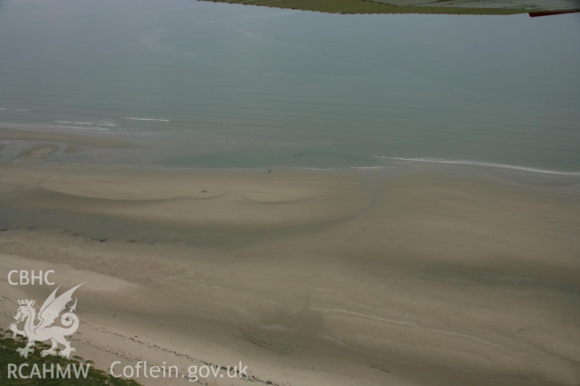 RCAHMW colour oblique photograph of P-38 Lightning, aircraft wreck at low tide. Taken by Toby Driver on 08/10/2007.