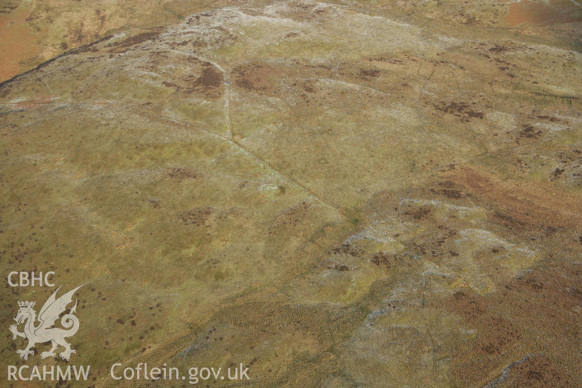 RCAHMW colour oblique aerial photograph of Bryn Gwyn Deserted Rural Settlement. Taken on 25 January 2007 by Toby Driver