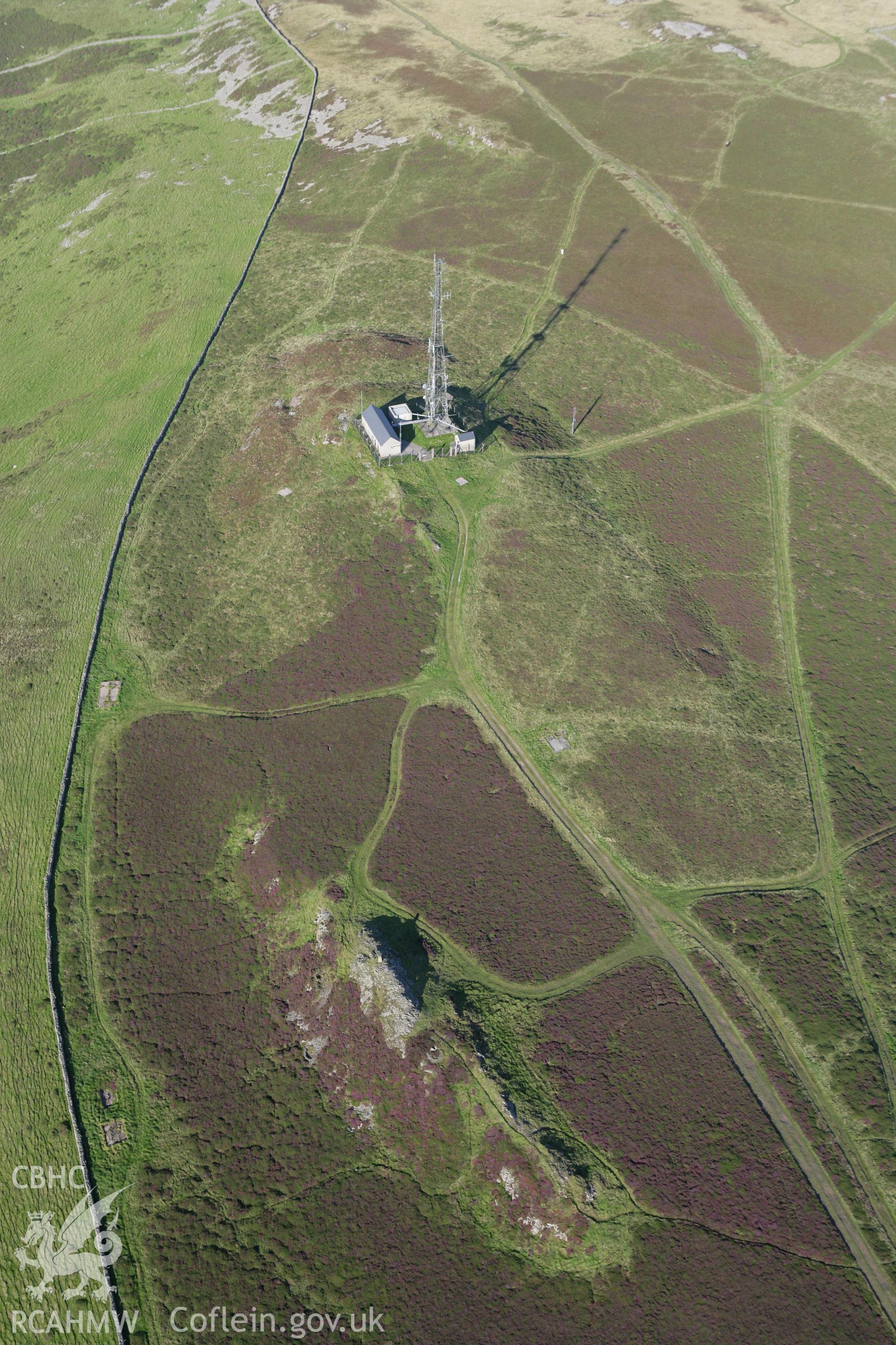 RCAHMW colour oblique aerial photograph of a cairn on Mynydd Rhiw. Taken on 06 September 2007 by Toby Driver