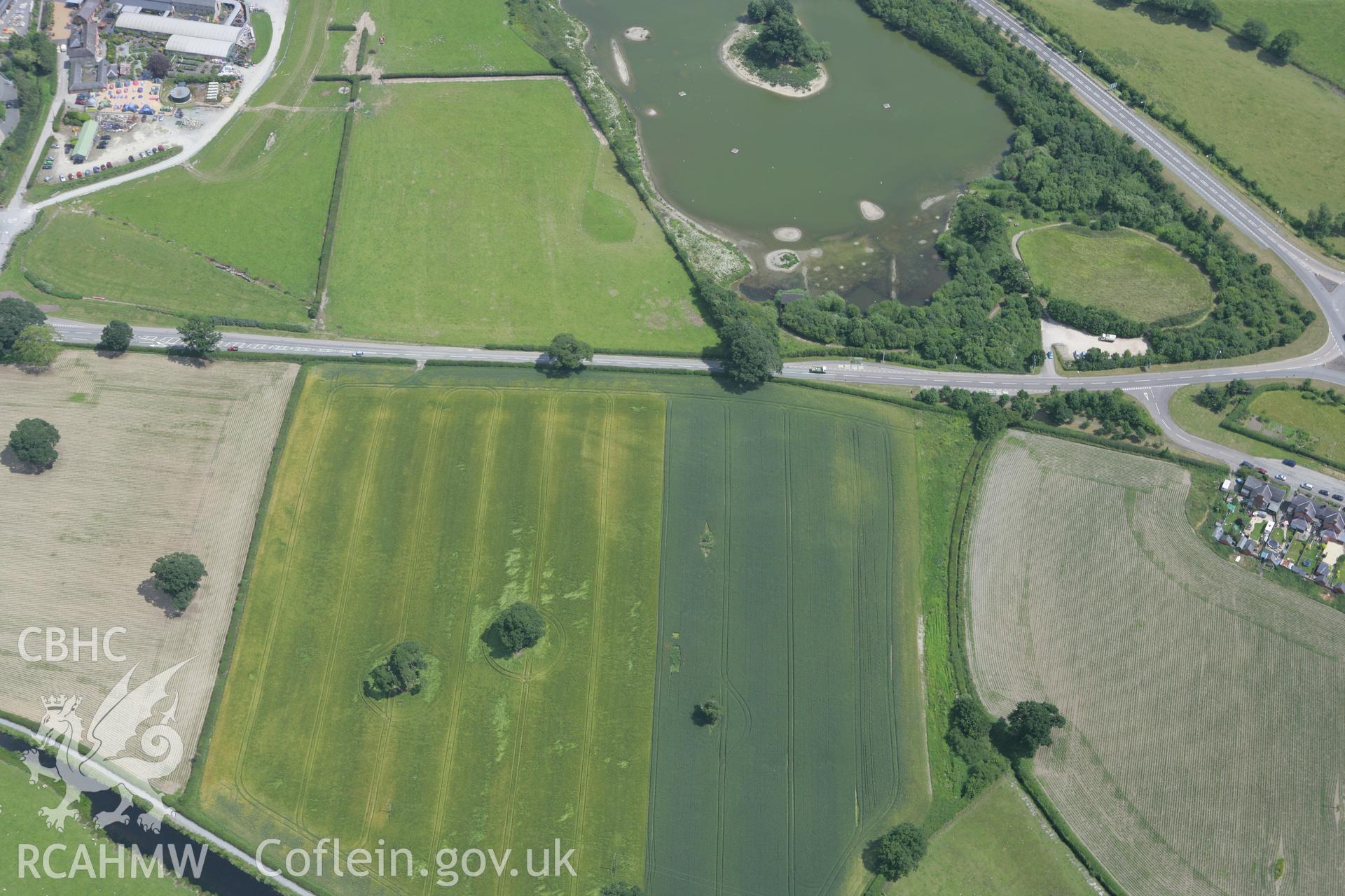 RCAHMW colour oblique photograph of Sarn-y-bryn Caled, parallel ditches. Taken by Toby Driver on 01/07/2008.