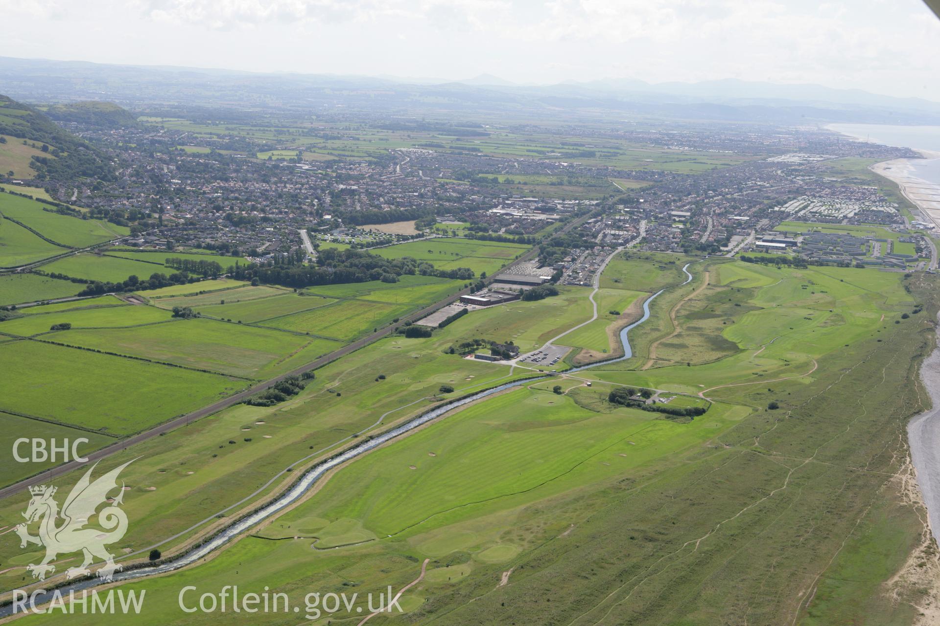 RCAHMW colour oblique aerial photograph of Prestatyn from the east. Taken on 31 July 2007 by Toby Driver